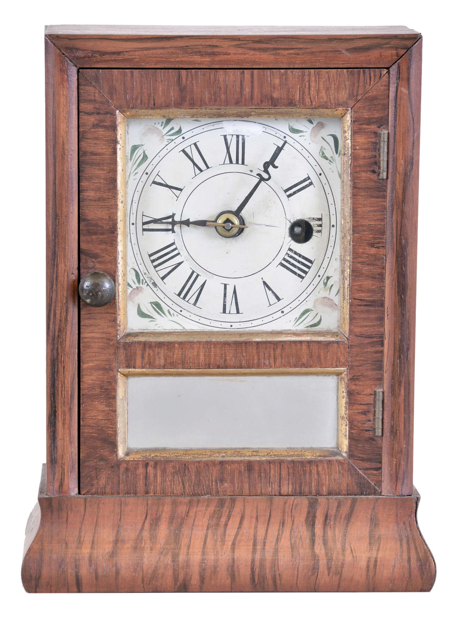 Seth Thomas Clock Co., Plymouth Hollow, Conn., 30 hour, spring brass movement cottage timepiece. This looks to be a prototype or one of the earliest examples as the movement has a brass spring and flower spandrels on the dial. — Antique Clocks Price Guide