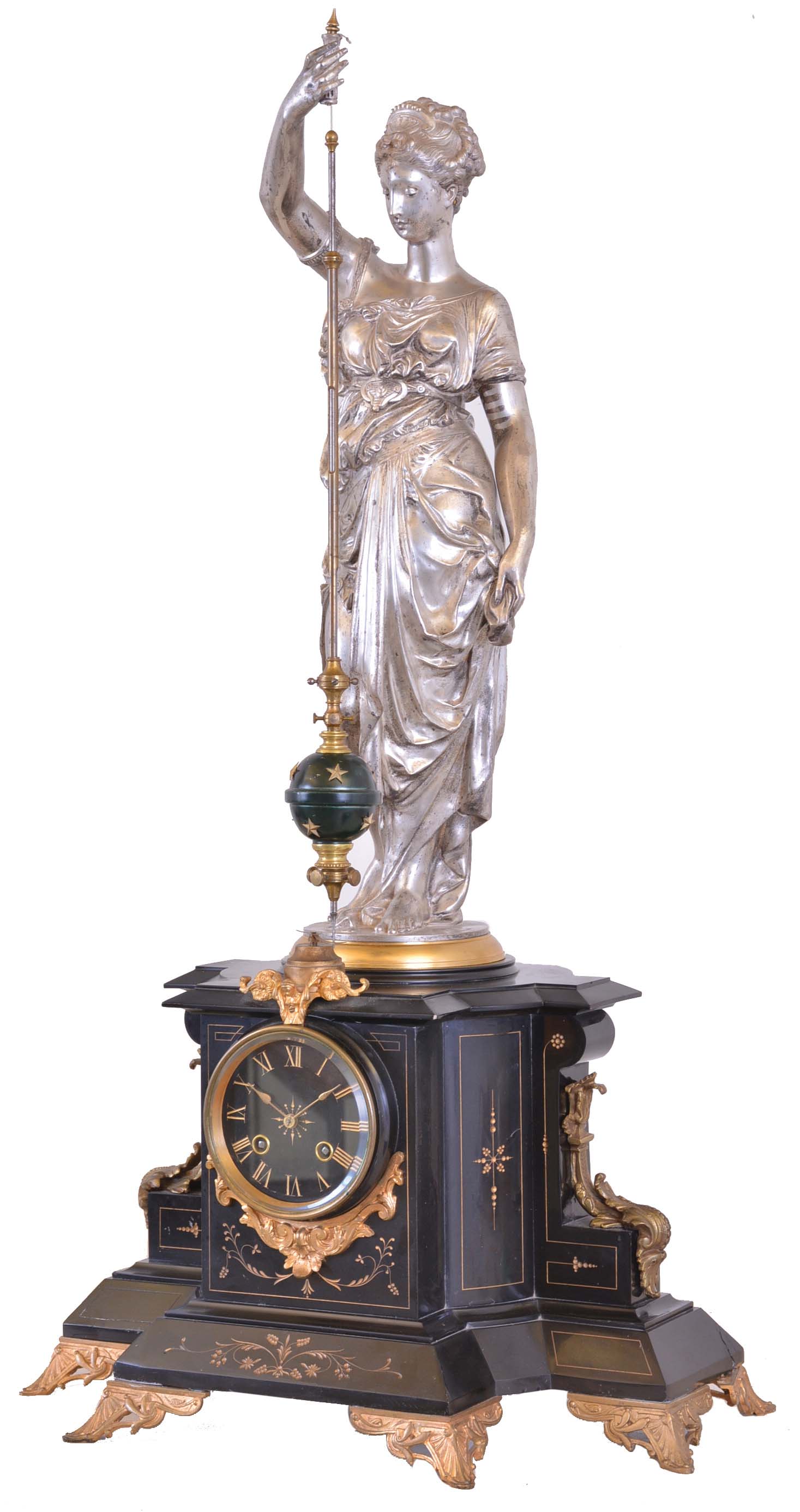 France, a monumental figural mantel clock with conical pendulum, the black slate case with gilt, incised line decoration and mounted with cast foliate ornament, the top with silvered, standing female figure in flowing garb, with right arm held aloft and supporting the pendulum, the base signed "S. Fouquet", black slate dial with gilt Roman numerals, gilt spade hands, and 8 day time and strike pendule de Paris movement — Antique Clocks Price Guide