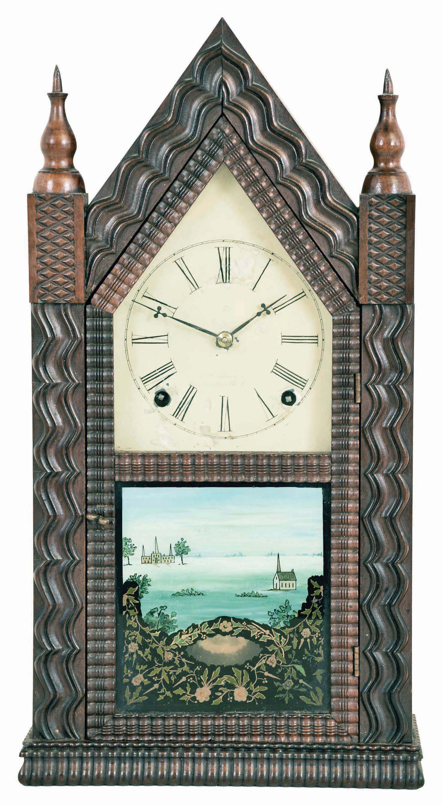 Forestville Manufacturing Co. (J. C. Brown). Bristol, Connecticut, 8 day brass time & strike movement in ripple front sharp Gothic or "steeple" clock. — Antique Clocks Price Guide