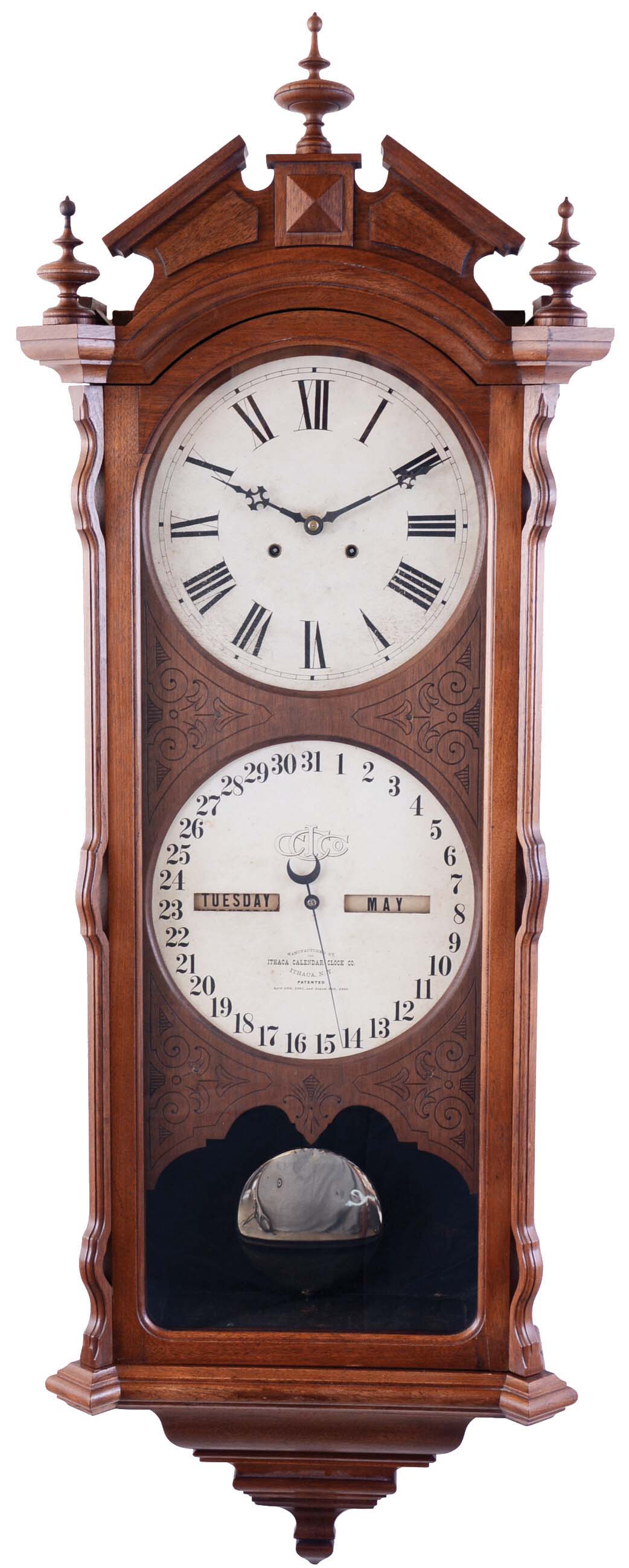 Ithaca Calendar Clock Co., Ithaca, NY, "No. 2 Bank" wall hanging clock with a weight driven 8 day timepiece movement and perpetual calendar mechanism in a walnut case. — Antique Clocks Price Guide