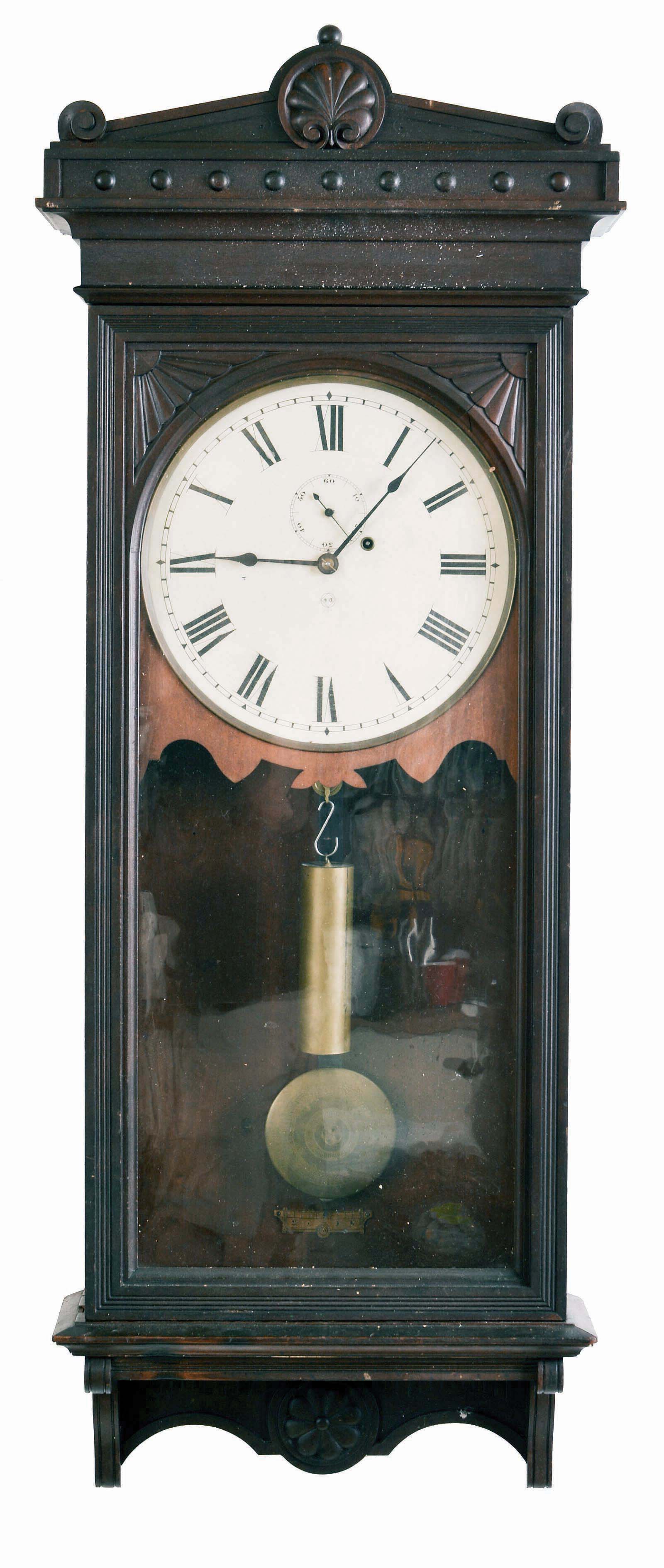 Seth Thomas Clock Co., Thomaston, Conn., "Regulator No. 30" with an 8 day timepiece movement in a cherry case. — Antique Clocks Price Guide