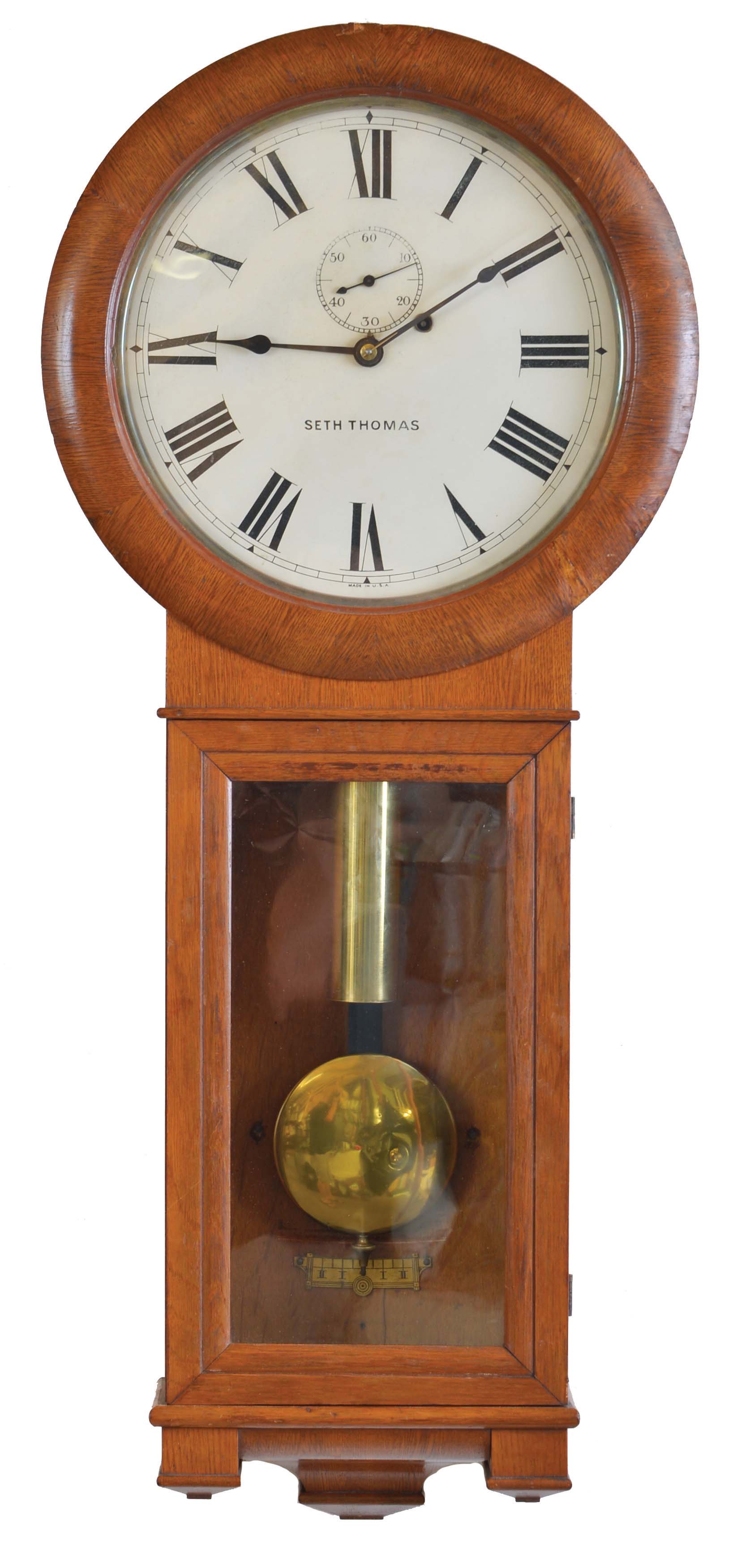 Seth Thomas Clock Co., Thomaston, Conn., "Regulator No. 2", 8 day, weight movement brass wall timepiece. — Antique Clocks Price Guide