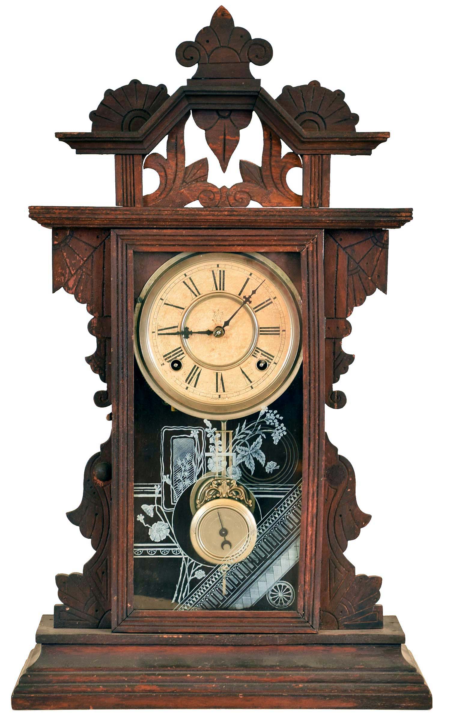 Clocks- 3 (Three): (1) Waterbury Clock Co., Waterbury, Conn., "Foster" shelf clock with an 8 day spring driven time and strike movement in a walnut case, c1900. (2) "Regal No. ?" Gilbert Kitchen Mantel clock with an 8 day spring driven time and strike movement in an oak case, c1900. (3) E. N. Welch Clock Co., Forestville, Conn., "Coghlan" shelf clock with an 8 day spring driven time and strike movement in a walnut case, c1886. — Antique Clocks Price Guide