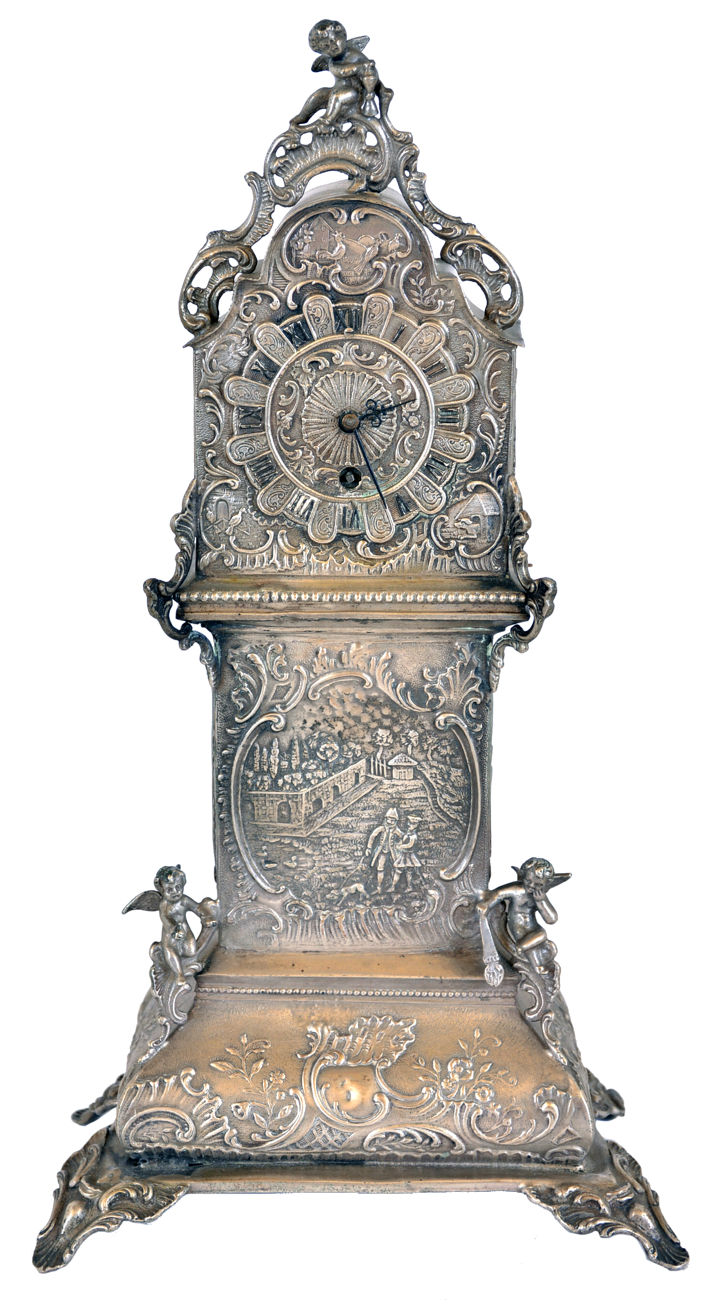 Desk clock in miniature tall clock form, silver case with bombe base and arch top, decorated with rococo style, repousse ornament, and with three cast putti, containing a thirty hour, continental verge fusee watch movement, 19th century — Antique Clocks Price Guide