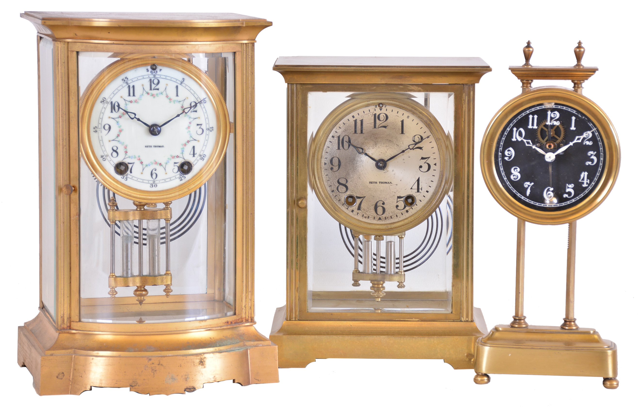 Clocks- 3 (Three): (1) English, 30 hour, weight brass movement gravity timepiece, c1925 (2) Seth Thomas Clock Co., Thomaston, Conn., "Empire No. 160" 8 day, time and strike spring brass movement crystal regulator mantel clock, c1925 (3) Seth Thomas Clock Co., Thomaston, Conn., "Empire 201", 8 day, time and strike spring brass movement crystal regulator mantel clock, c1907 — Antique Clocks Price Guide
