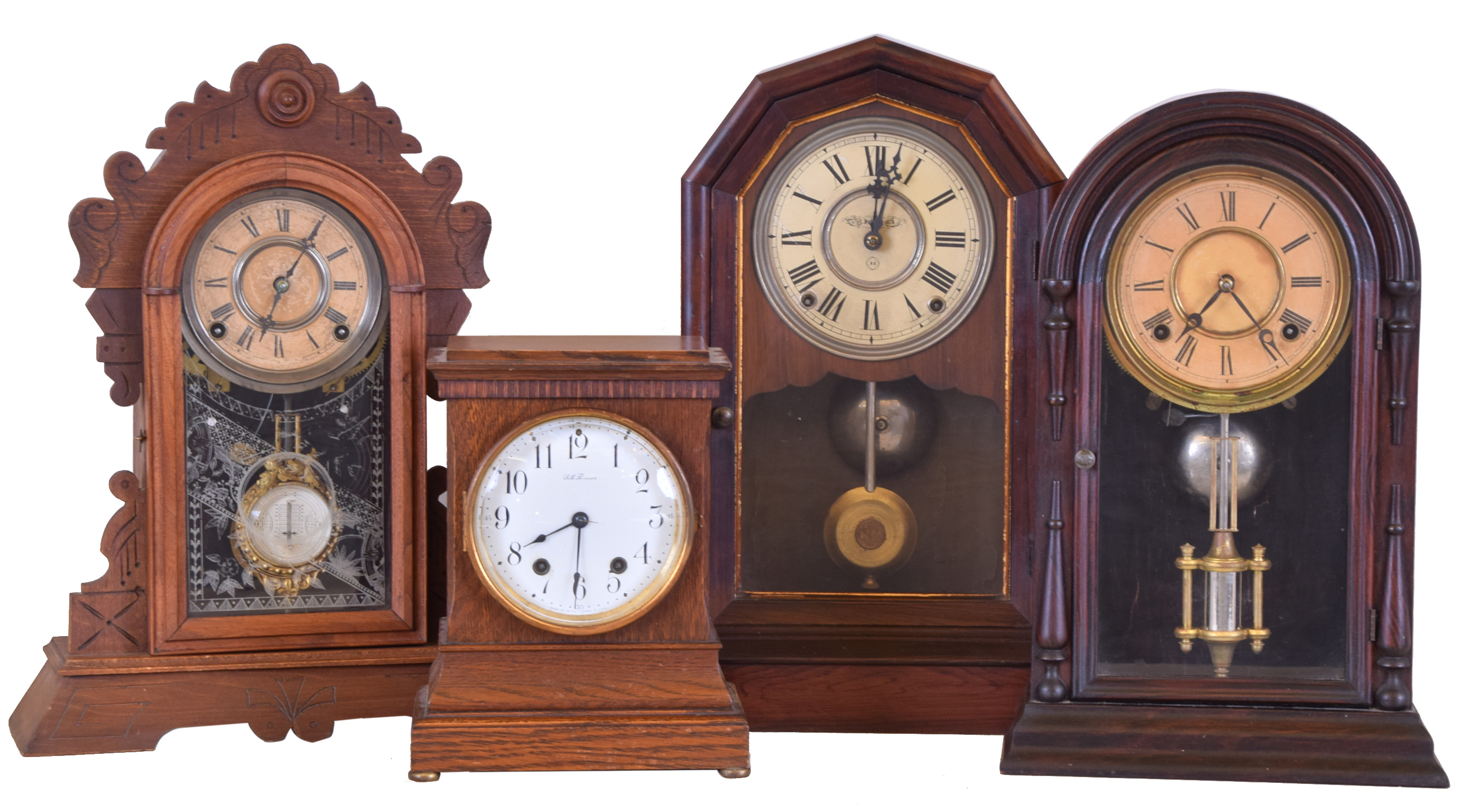 Clocks- 4 (Four): (1) Seth Thomas Clock Co., Thomaston, Conn., "Wales" shelf clock with a spring driven 8 day time and half hour strike movement in a golden oak case, c1904.. (2) Seth Thomas Clock Co., "Richmond V.P." shelf clock with a spring driven 8 day time and strike lyre movement in a rosewood veneered case, c1890. (3) F. Kroeber, New York, "Wasp" shelf clock with a spring driven 8 day time and strike movement in a walnut case, c1884. (4) Welch, Spring and Co. "Italian No. 2 V.P." shelf clock with a spring driven 8 day time and strike movement in a rosewood veneered case, c1880. — Antique Clocks Price Guide