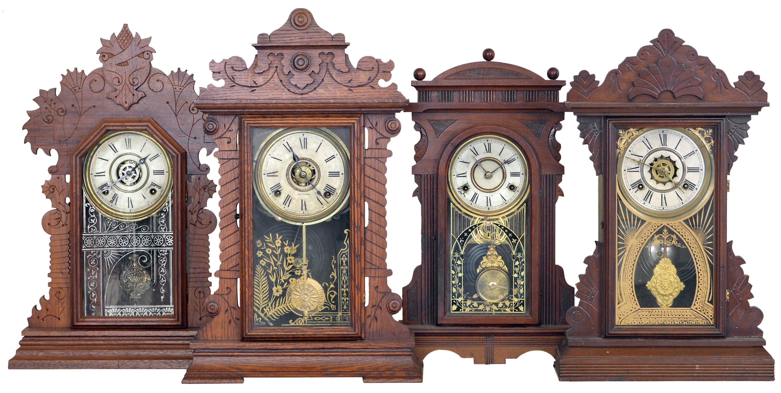 Clocks- 4 (Four): (1) E. Ingraham & Co., Bristol, Conn., "Sun", 8 day, time, strike and alarm spring brass movement shelf clock, c1891 (2) Waterbury Clock Co., Waterbury, Conn., 8 day, time, strike and alarm brass movement shelf clock, c1885 (3) New Haven Clock Co., New Haven, Conn., "Arno", 8 day, time and strike spring brass movement shelf clock, c1883 (4) Seth Thomas Clock Co., Thomaston, Conn., 8 day, time, strike and alarm spring brass movement shelf clock, c1880 — Antique Clocks Price Guide