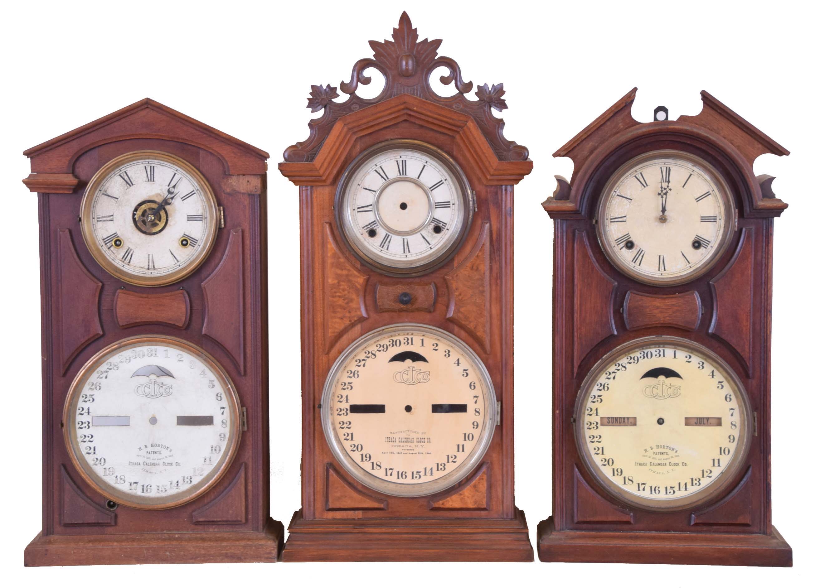 Clocks- 3 (Three): (1) Ithaca Calendar Clock Co., Ithaca, New York, "No. 8 Shelf Library", 8 day, time and strike spring brass movement double dial calendar clock. (2) Ithaca Calendar Clock Co., Ithaca, New York, "No. 7 Shelf Cottage", 8 day, time and strike double dial calendar clock. (3) Ithaca Calendar Clock Co., Ithaca, New York, "No. 8, Shelf Library", 30 day, time spring brass movement double dial calendar clock. — Antique Clocks Price Guide