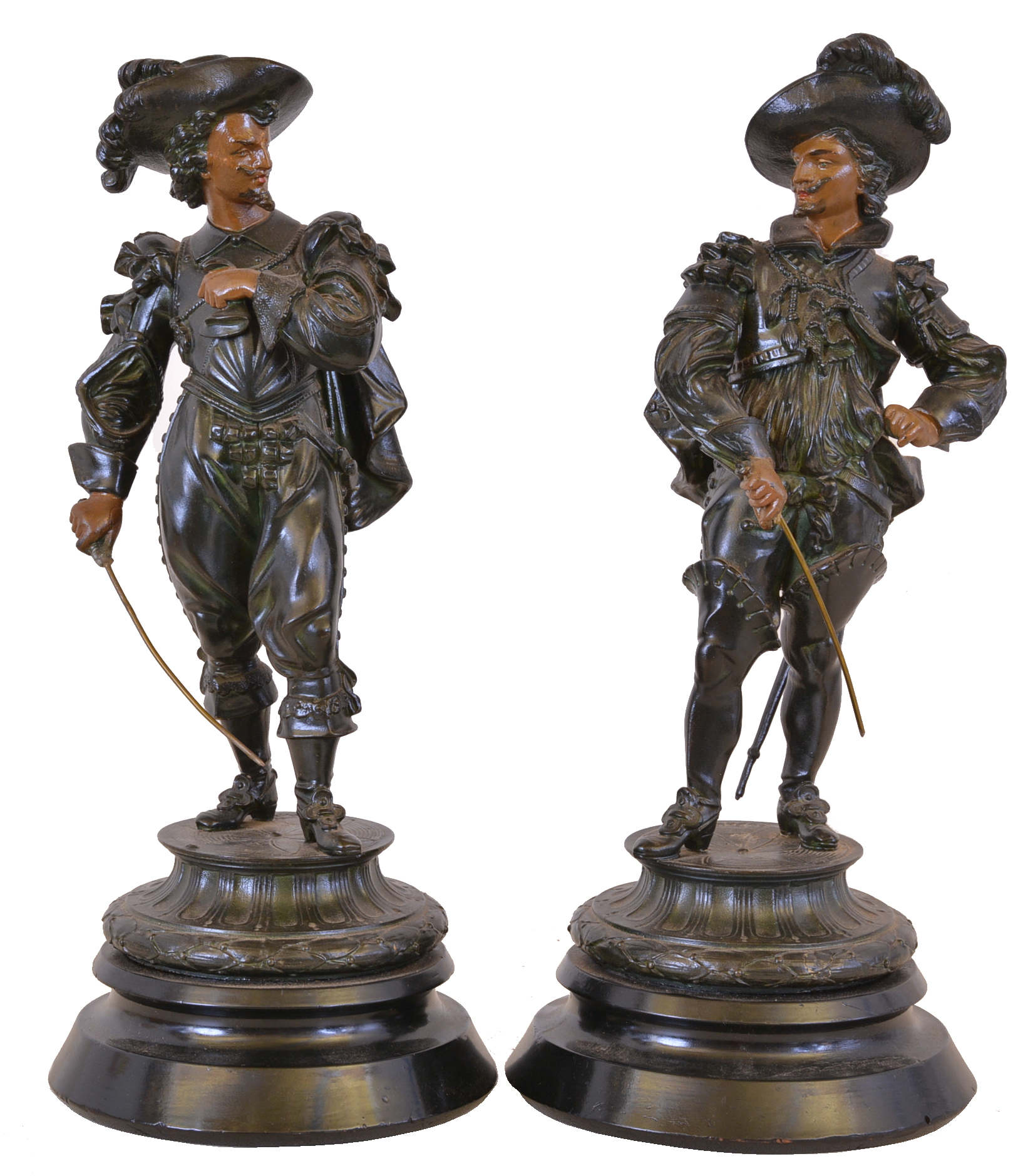 Two cast spelter figures on ebonized wooden bases, probably representing Don Caesar and Don Juan, or two of the musketeers — Antique Clocks Price Guide