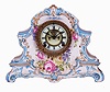 Clocks- 2 (Two): (1) Ansonia Clock Co., New York. "La Nord" shelf clock with an 8 days spring driven time and strike brass movement with visible escapement in a Royal Bonn porcelain case. (2) Ansonia Clock Co., New York. "La Manche" shelf clock with an 8 days spring driven time and strike brass movement with visible escapement in a Royal Bonn porcelain case.