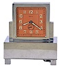 Renova, Switzerland musical alarm clock 8 day, time and alarm, spring driven movement in nickel plated case with luminous dial