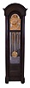Herschede Hall Clock Co., Cincinnati, Ohio, "Pattern No. 86" hall clock, 8 day, time, strike and chime on 9 tubular bells, three brass weight driven movement in a mahogany case with full columns, beveled glass door and sides, arch top and resting on bun feet. The silvered brass dial has moon phase, spandrels, tune selector for Westminster or Whittington serial #7272