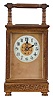 France, carriage clock, gilt case decorated with pierced frets of various design, Arabic numeral white enamel dial with gilt mask, blued steel hands, 8 day time and strike movement with lever platform