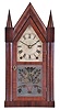 Brewster & Ingrahams, Bristol, Conn., Sharp Gothic or steeple shelf clock with a spring driven 8 day time and strike movement in a mahogany veneered case.