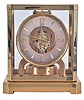 LeCoultre, Switzerland, Atmos clock, glazed, gilt brass case, silvered Arabic numeral and arrow marker dial, 15 jewel caliber 519 movement, serial #37110