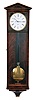 Leopold Horrer in Wien, Dachluhr, six light, mahogany veneered case with contrasting banding, base with incurved bracket, top with pitched pediment and beveled moldings, Roman numeral, one piece white enamel dial with engine turned, gilt bezel, blued steel hands, 8 day timepiece movement with tapered plates, baluster form pillars, and deadbeat escapement, brass pendulum with ebonized wooden rod, and brass weight