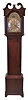 England, tall clock movement, 8 day, time and strike, weight driven movement, c. 1775 in an English or Scottish mahogany case with broken arch top, with reeded columns flanking hood and reeded corner columns flanking trunk door, c. 1800. The brass dial with silvered chapter ring has brass spandrels and rocking ship in arch with small subsidiary date calendar