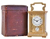 France, carriage clock, rectilinear gilt brass case, with reeded base and frieze, gilt, pierced and engraved dial mask, Arabic numeral white enamel dial, blued steel spade and poker hands, 8 day timepiece movement with alarm and cylinder platform, leather covered travel case