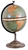 Geographical Clock Co., Chicago, Ill., "Globe Chronometer", the 20" globe with world map with annular clock dial at the equator, showing "the Time at All Places on the Earth at the Same Moment", the map also showing currents, rail lines, submarine telegraph lines, and mean isothermal lines, mounted to a nickel plated brass base, with Waterbury 8 day timepiece movement, globe sections marked "No. 1"