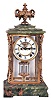 Ansonia Clock Co., New York, NY, "Laureate", 8 day, time and strike spring brass movement, crystal regulator with fancy brass and onyx case.