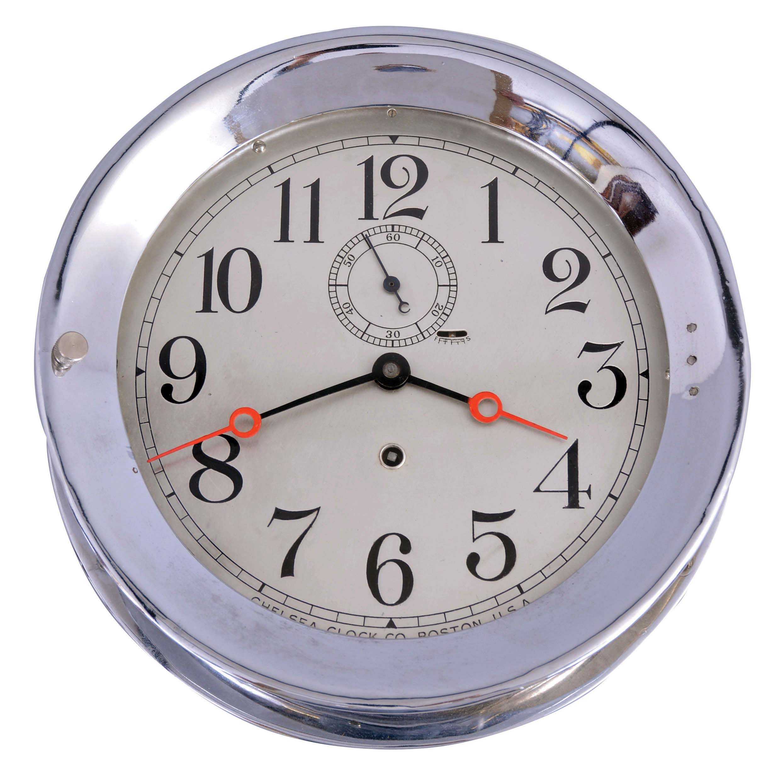 Chelsea Clock Co., Boston, Mass., "Pilot House" wall clock, polished, nickel plated brass case, 8 1/2" Arabic numeral silvered dial with large seconds bit, blued steel moon hands, 8 day timepiece movement with rectangular plates, serial #277736 — Antique Clocks Price Guide