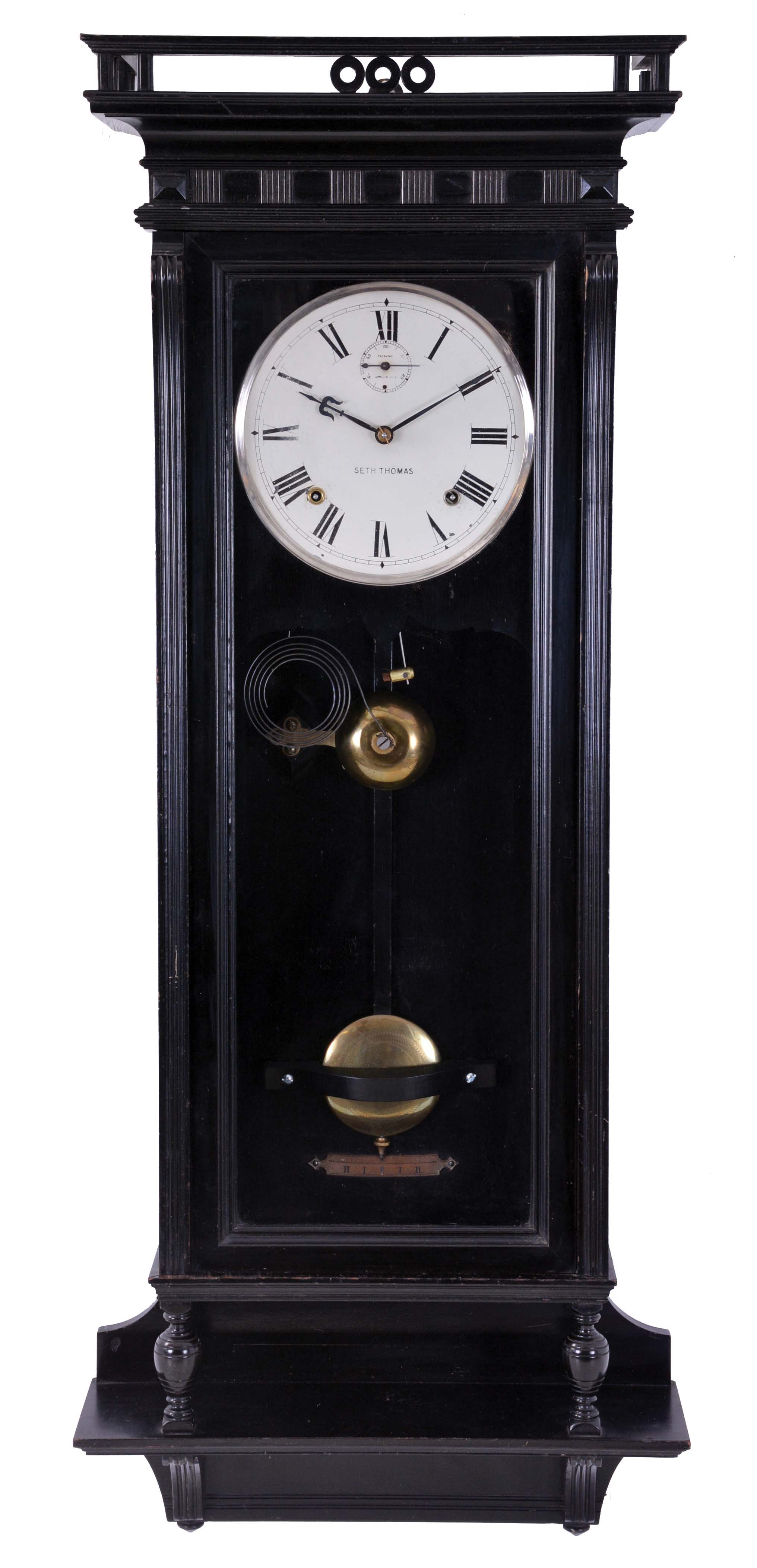Seth Thomas Clock Co., Thomaston, Conn., "Suez" wall clock with an 8 day spring driven time and strike movement in an ebonized finish case. — Antique Clocks Price Guide