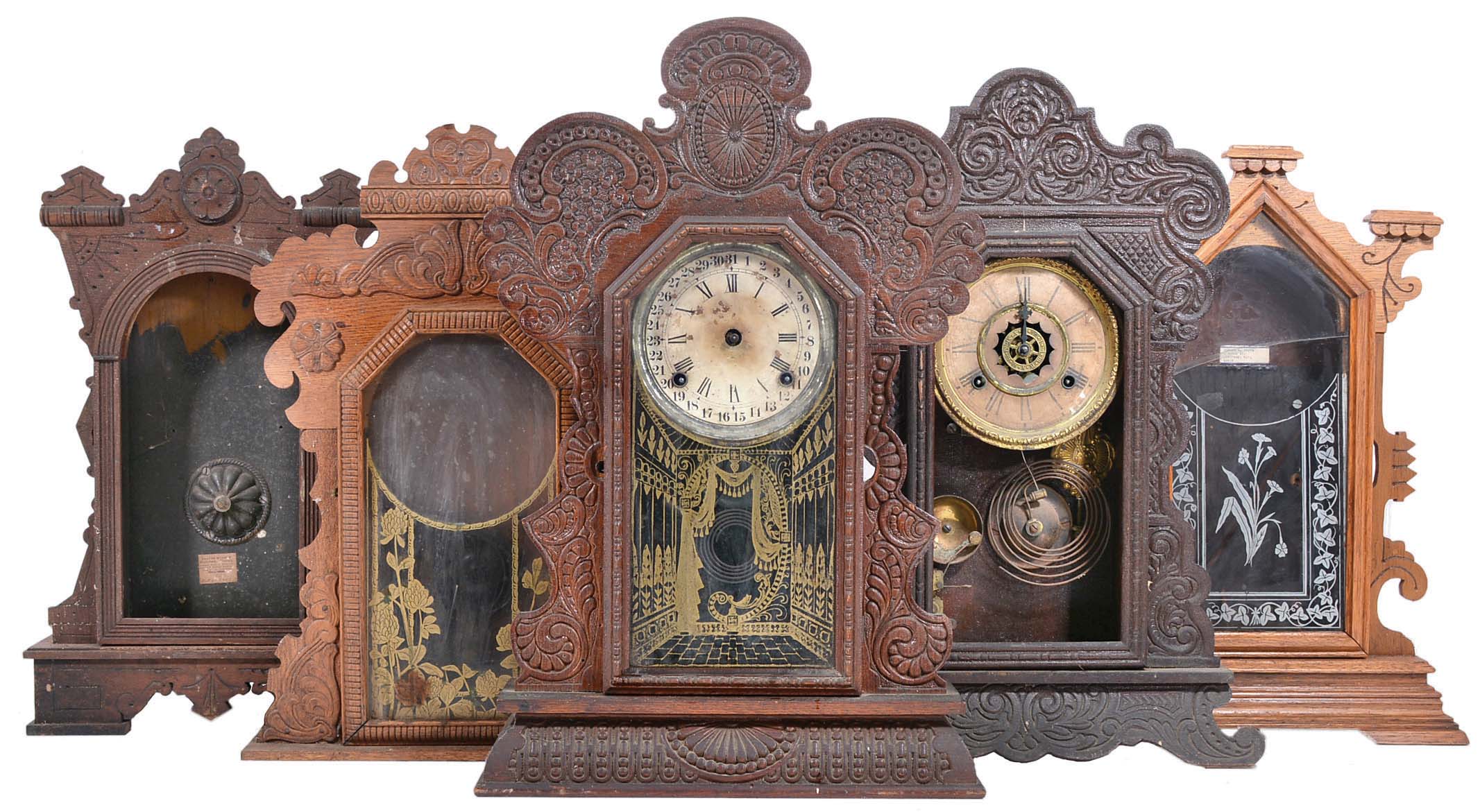 Clocks and Clock Cases- 16 (Sixteen) American Gingerbread: 12 (Twelve) complete clocks in a range of conditions and 4 (Four) case only — Antique Clocks Price Guide