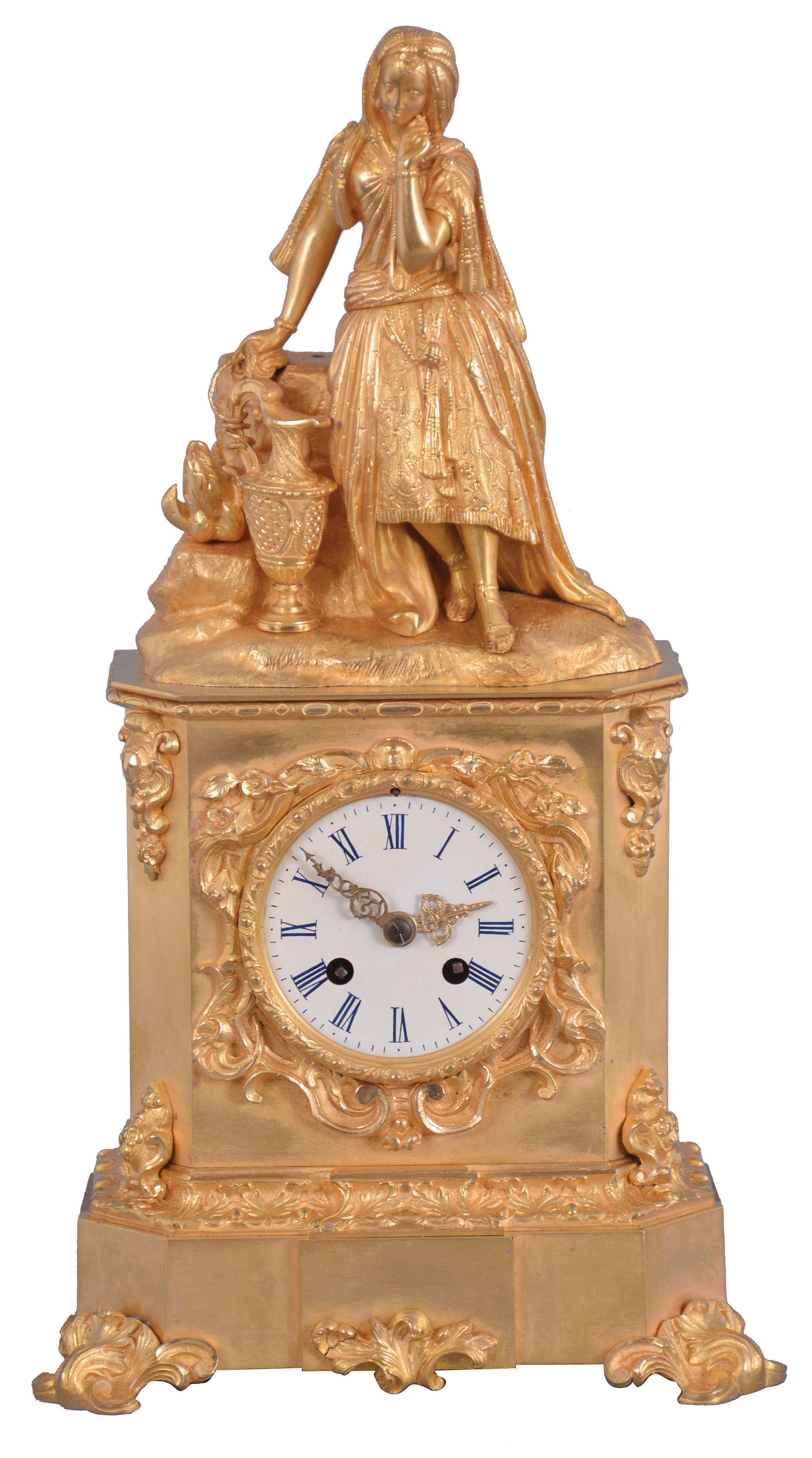 France, a mid 19th century figural mantel clock, gilt bronze case with rococo revival ornament, the top with a young woman with fancy dress and head scarf, resting against a stump, taking a rest from carrying her ewer, Roman numeral white painted dial, gilt Louis XV hands, 8 day pendule de Paris movement by Raingo Freres — Antique Clocks Price Guide