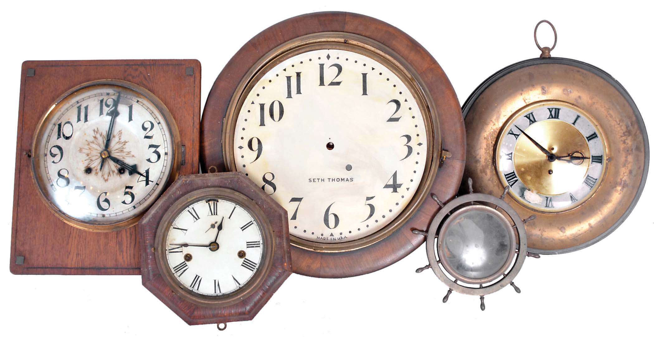 Clocks- 9 (Nine) wall clocks and 4 (Four) wall clock cases only: including a Seth Thomas marine clock in octagonal wood case and a vintage Seth Thomas jeweled ship's bell clock in a brass case. — Antique Clocks Price Guide