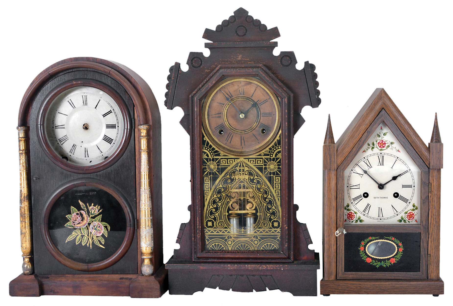 Clocks- 20 (Twenty) mantel and desk clocks: 3 (Three) black mantel clocks, 2 (Two) weight-driven ogee clocks, many wood cased mantel clocks, 2 (Two) Barr clocks for parts, a Seth Thomas chime clock, and a 400-day clock. Makers include Seth Thomas, Ansonia, Kundo, Barr, Waterbury, Ingraham, Chauncey Jerome, and H. Webster. — Antique Clocks Price Guide
