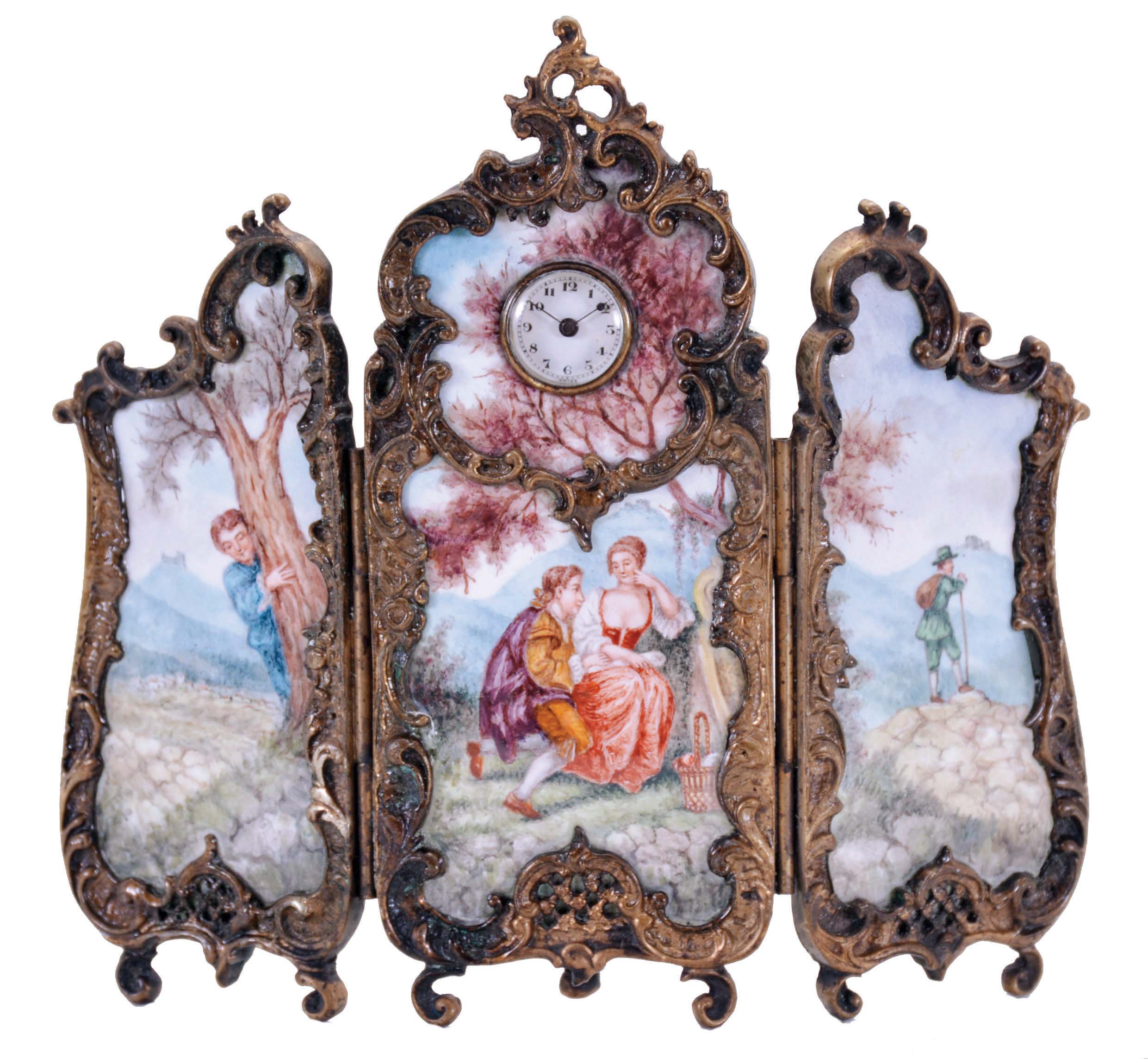 Switzerland, desk or bedside clock in the form of a folding screen, gilt brass frame with foliate ornament in the rococo style, each section set with conforming polychrome painted porcelain panels depicting people in landscapes, Arabic numeral white enamel dial with blued steel hands, 30 hour, 17 jewel keywound Swiss movement with lever escapement — Antique Clocks Price Guide