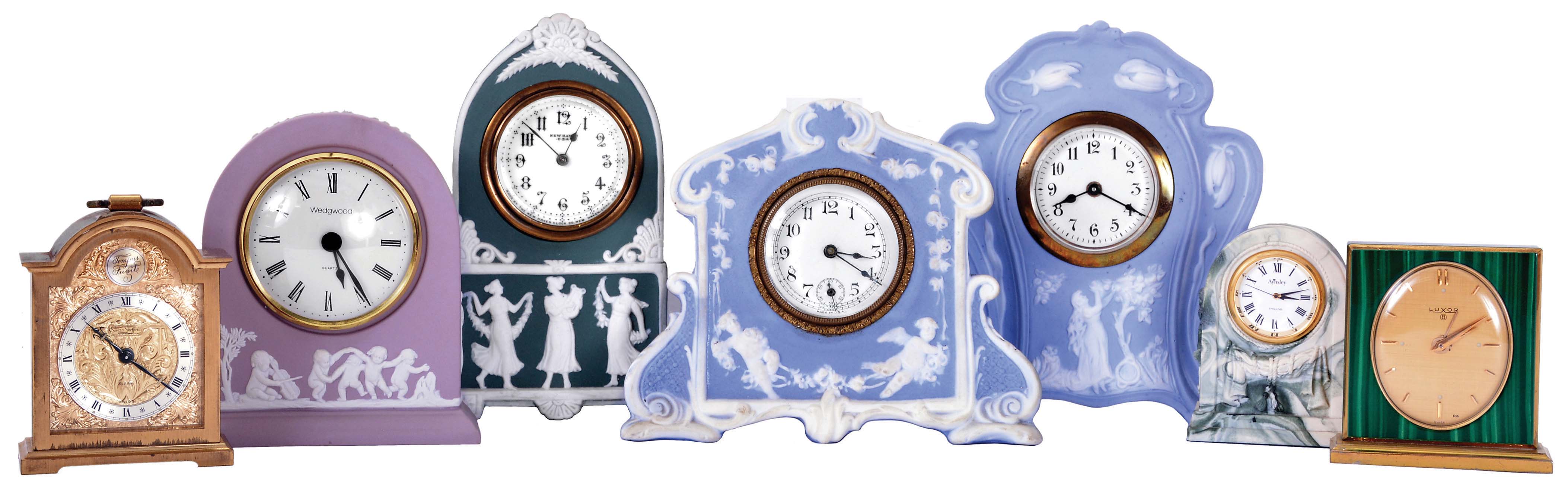 Clocks- 7 (Seven): Four with decorated jasper cases, one marked "Wedgwood", a "Luxor" with faux malachite case, an "Aynsley" with marbled Portlandware case, and a "Swiza" alarm in bracket clock form, mechanical and quartz movements, 20th century — Antique Clocks Price Guide