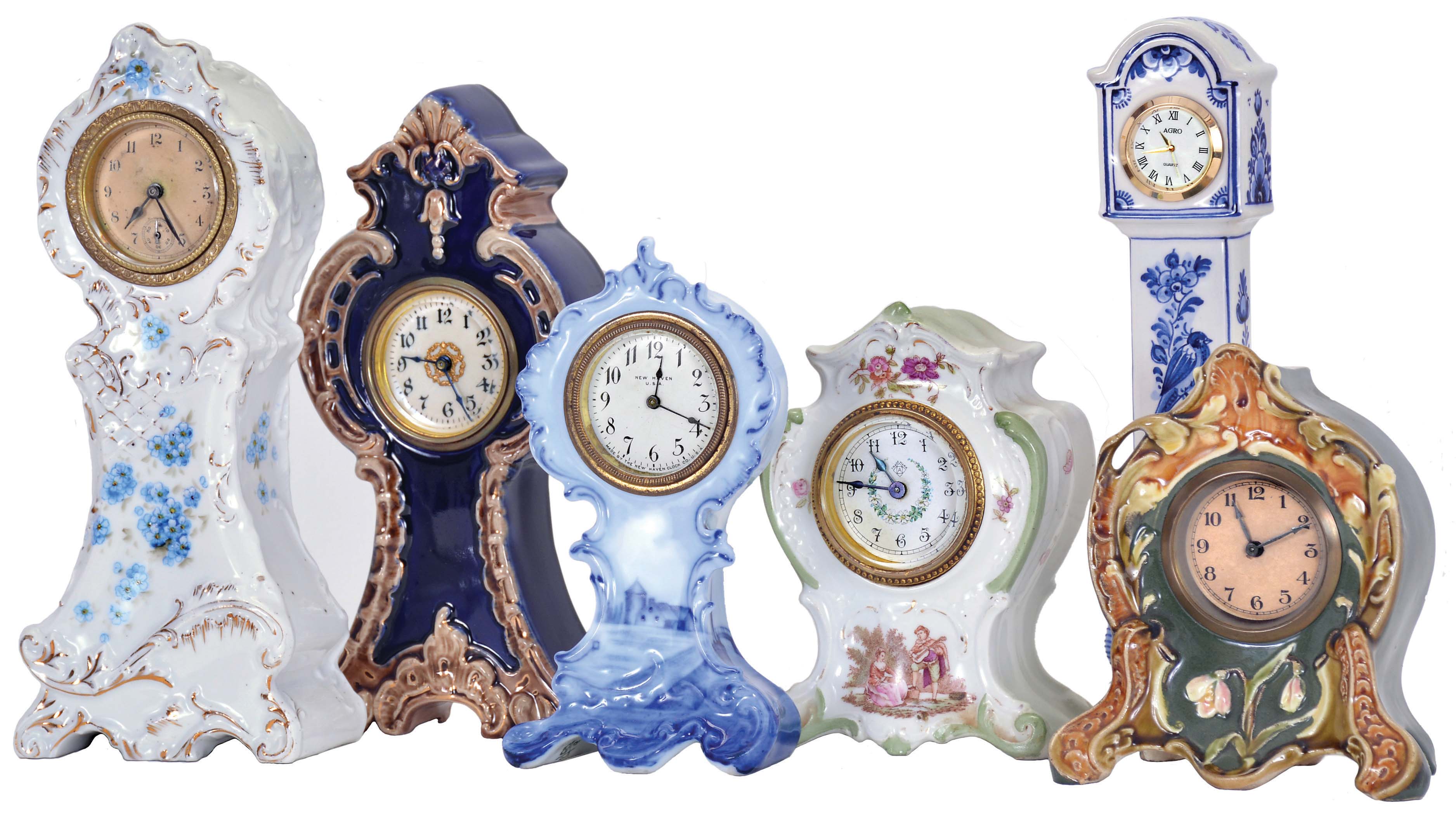 Clocks- 6 (Six): All with ceramic cases, including "R.S. Prussia", "Rosenthal", Majolica, and Delft, five with thirty hour timepiece movements, and one with quartz movement, Rosenthal case dimensions listed — Antique Clocks Price Guide