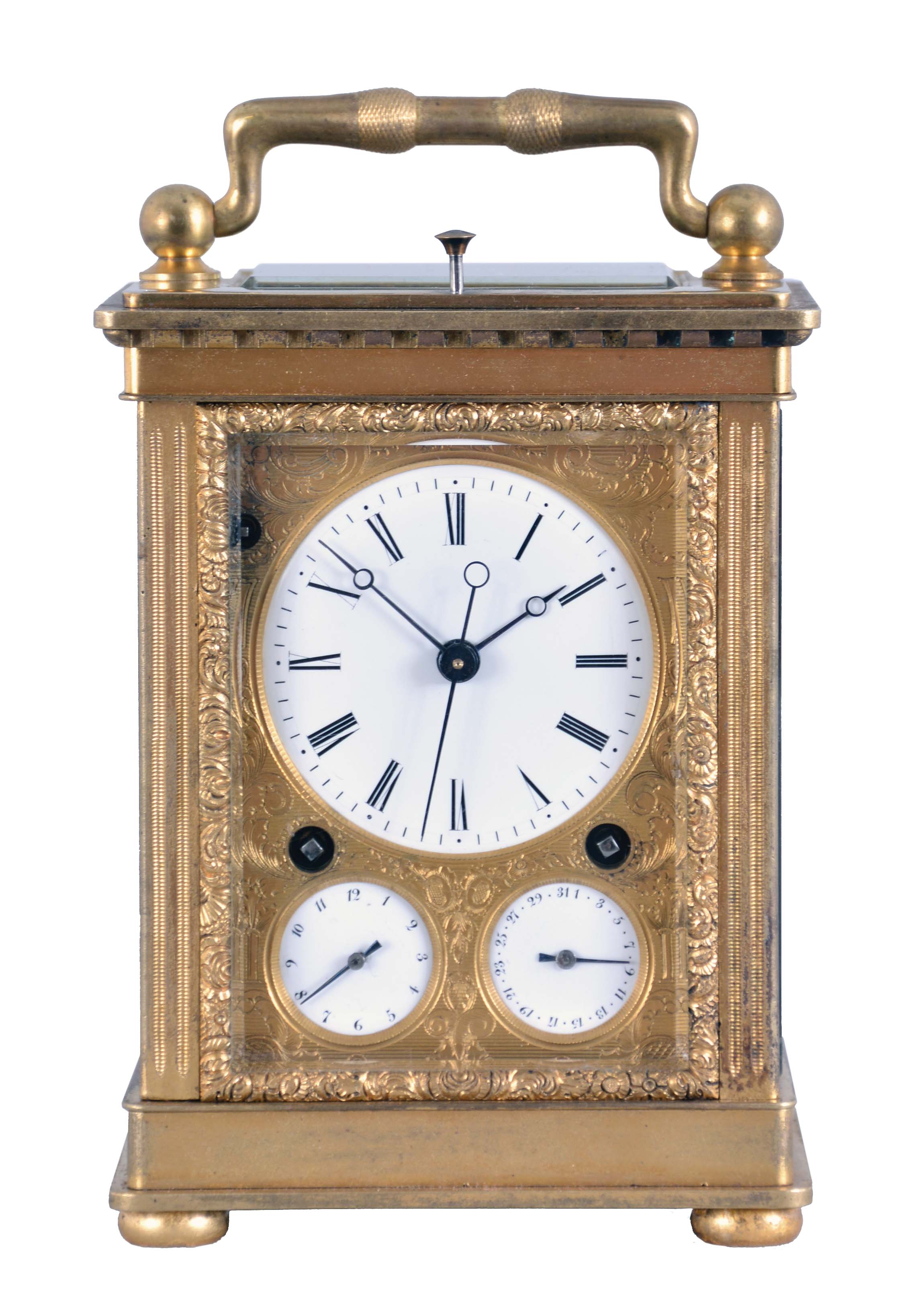 Attributed to Courvoisier, La Chaux de Fonds, Switzerland, quarter striking carriage clock with dead-center seconds, glazed, gilt brass case on turned feet, front door with scalloped ornament, gilt, engraved mask enframing the Roman numeral white enamel dial and subsidiary alarm and date displays, blued steel Breguet style hands, 8 day movement having a chronometer platform with pivoted detent escapement and five arm steel balance, and polished steel strike work with blued springs mounted to the back plate, grand sonnerie (night) striking changing automatically to petit sonnerie (day) striking every twelve hours, repeating the hours and quarters on demand, case bottom with sonnerie/ silent lever, case bottom numbered 118 — Antique Clocks Price Guide