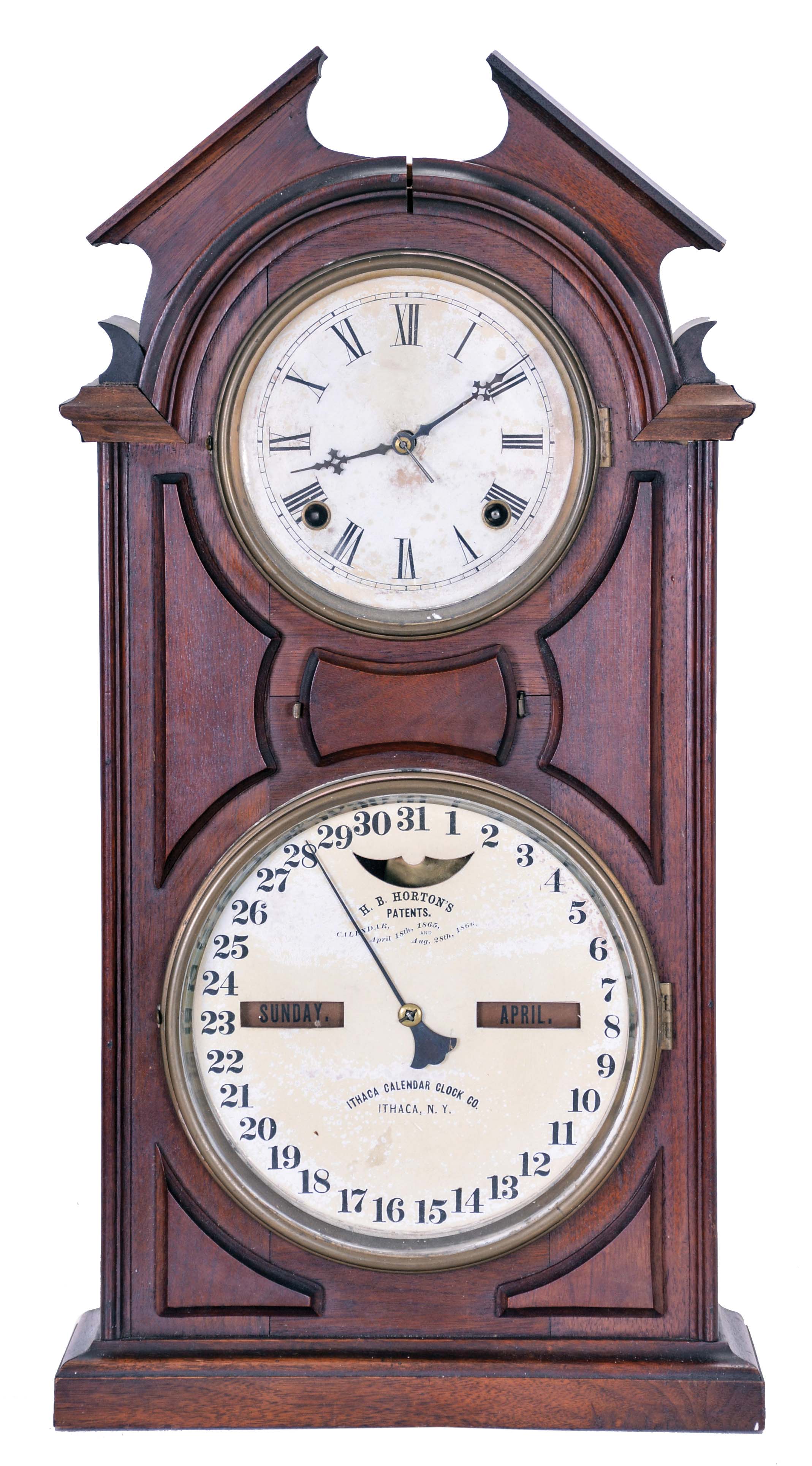Ithaca Calendar Clock Co., Ithaca, NY, "No. 8 Shelf Library" with a spring driven 30 day Hubbell time only movement and a perpetual calendar mechanism in a walnut case. — Antique Clocks Price Guide