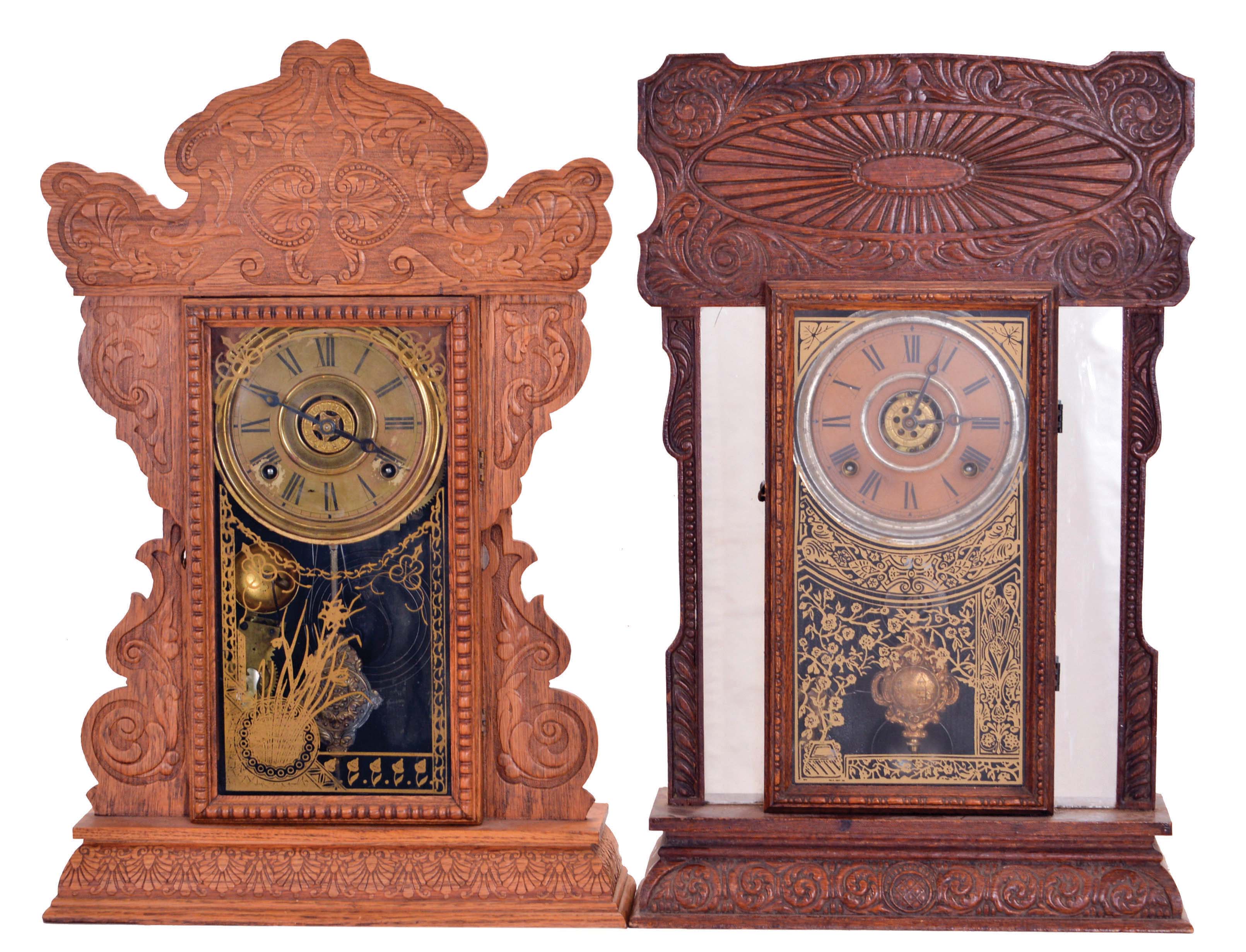 Clocks- 2 (Two): (1) E. N. Welch Mfg. Co., Forestville, Conn., "No. 23", day, time, strike and alarm spring driven movement kitchen clock, c1900; (2) E. Ingraham & Co., Bristol, Conn., "Reflector", 8 day, time, strike and alarm spring driven movement kitchen clock, c1910. — Antique Clocks Price Guide