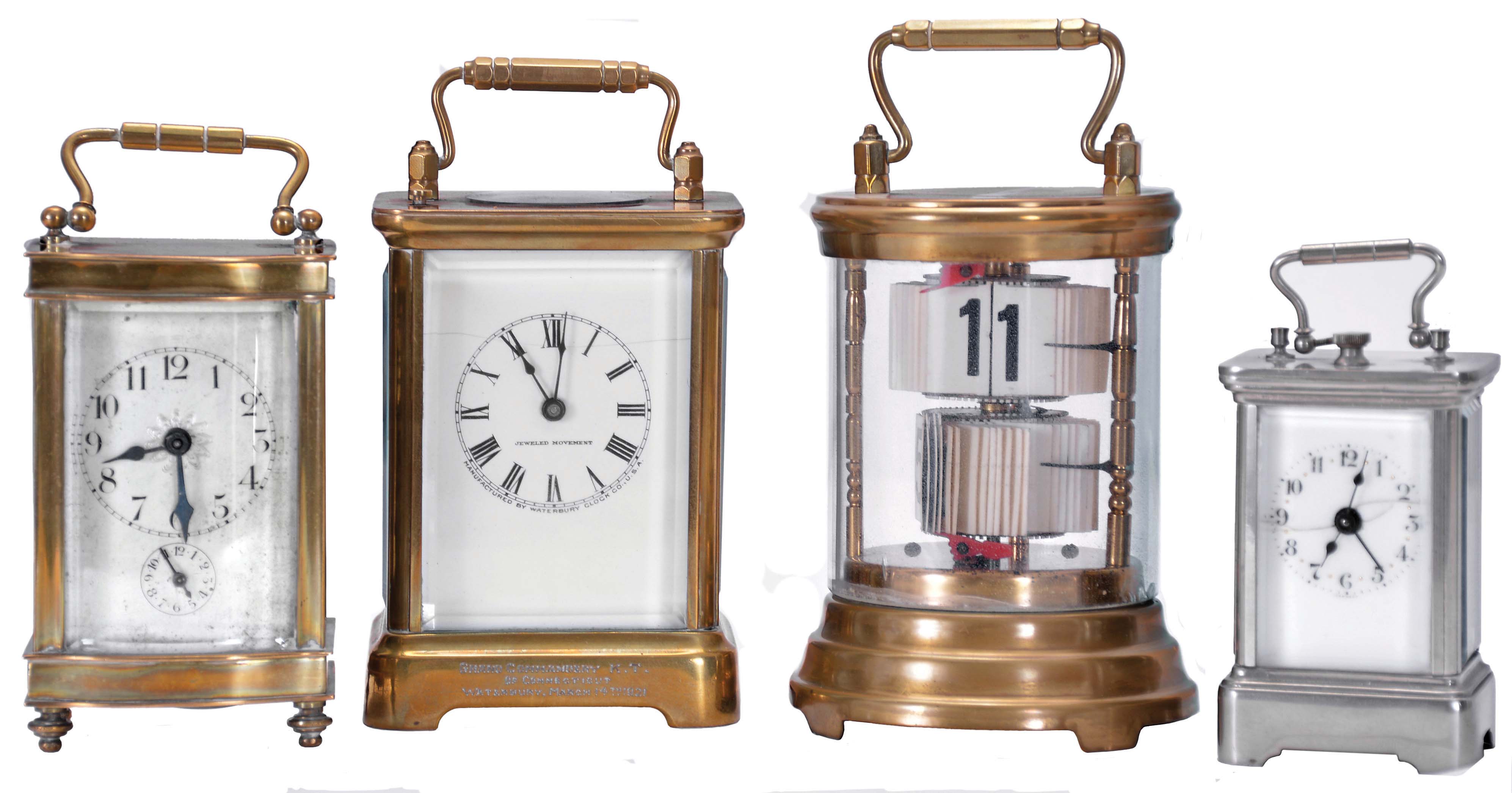 Carriage clocks- 4 (Four): One Waterbury time and strike with hour repeating, brass case with beveled glasses, Roman numeral white enamel dial, a "Plato" clock made in Germany for the Horolovar Clock Co. with brass case, and two German carriage clocks, both timepiece with alarm, one with brass case and beveled glasses, Arabic numeral silvered dial, the other with nickel plated case and Arabic numeral enamel dial, dimensions of Waterbury listed — Antique Clocks Price Guide