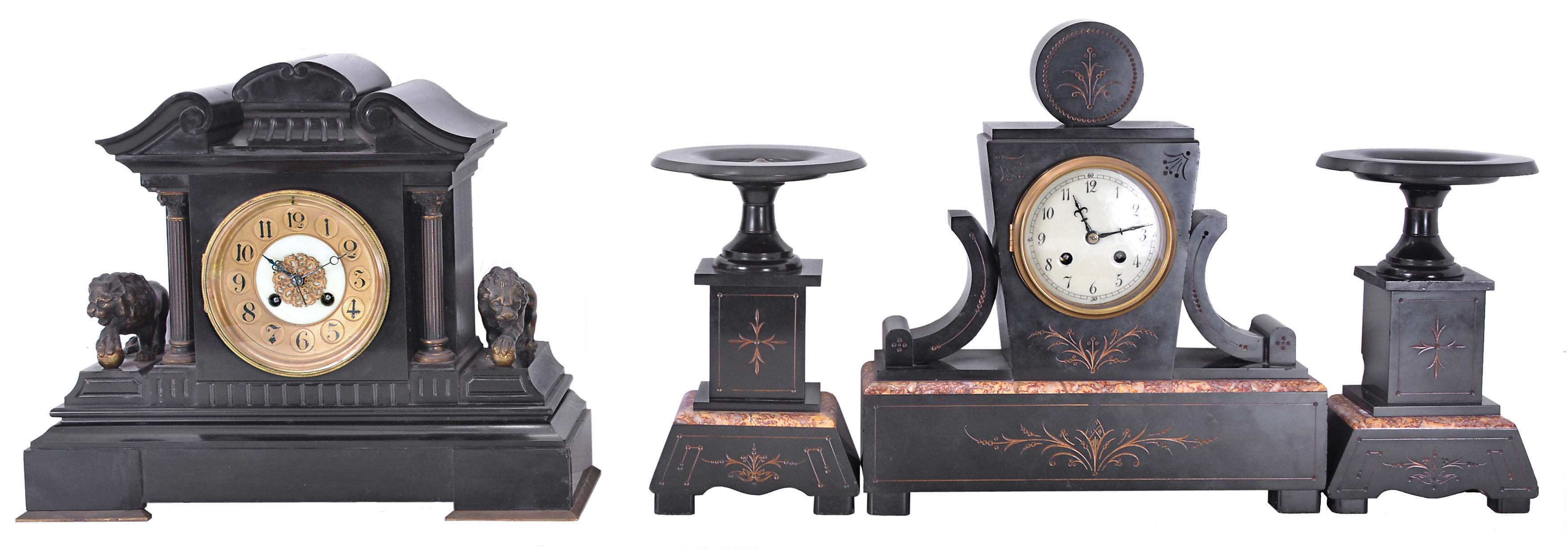 Clocks- 2 (Two) French black slate mantel clocks: (1) 8 day spring driven movement time and strike movement with count wheel and bell in a black slate case with marble accents and matching pair of side pieces; (2) 8 day spring driven movement time and strike movement with rack and snail strike in a black slate case flanked by metal lion figures. Movement has the Japy Freres Med. D'Honneur stamp. — Antique Clocks Price Guide