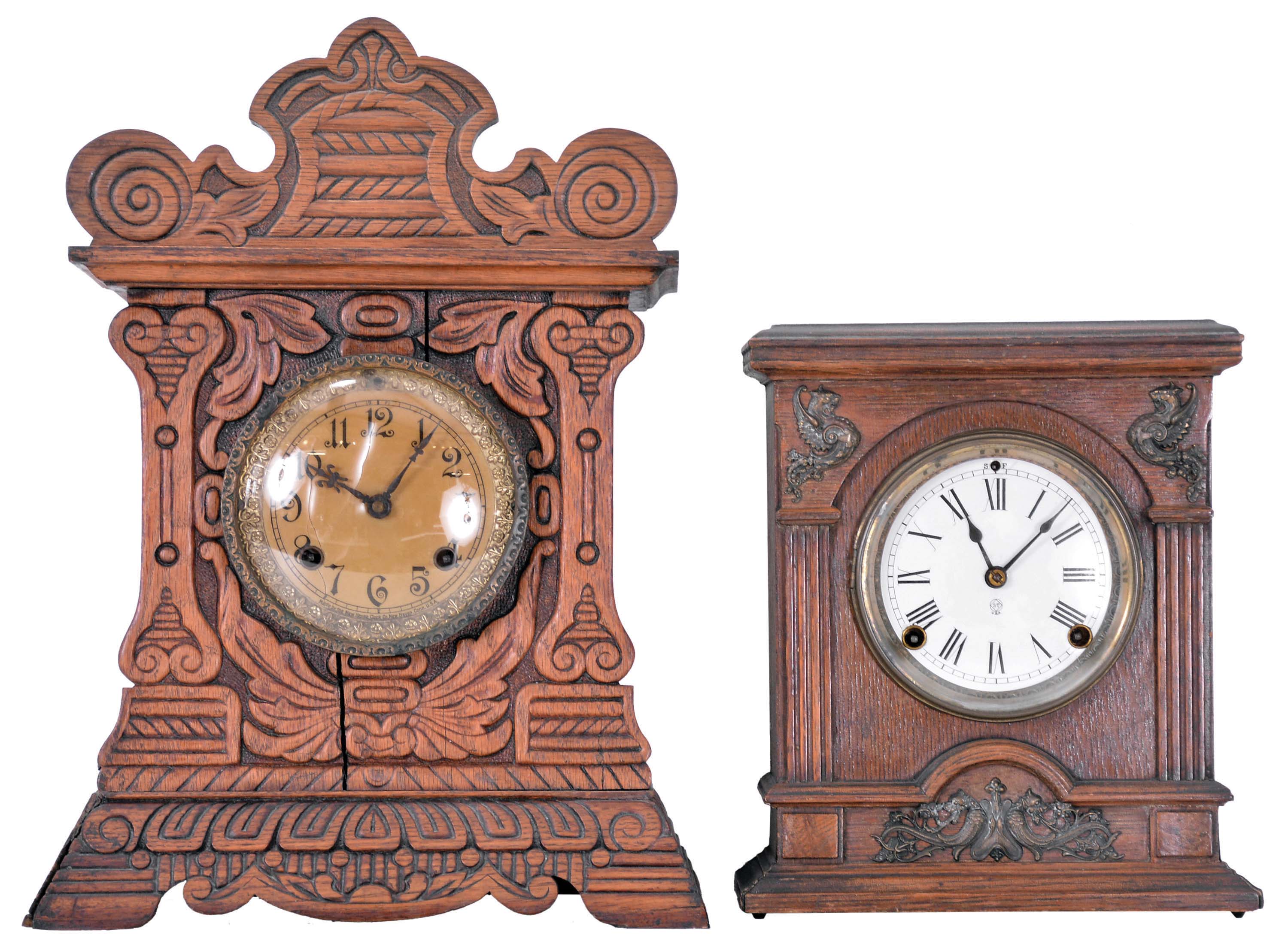 Clocks- 4 (Four) American Wood Case: (1) Seth Thomas Clock Co., Thomaston, Conn., 8 day, time and strike, spring driven movement cabinet clock in oak case with applied metal griffin ornaments, c1892; (2) New Haven Clock Co., New Haven, Conn., "Congressional Line", 8 day, time and strike, spring driven movement cabinet clock in oak case, c1895; (3) Waterbury Clock Co., Waterbury, Conn., "Festus", 8 day, time and strike, spring driven movement gingerbread clock in oak case, c1906; (4) Forestville Manufacturing Company, Bristol, Conn., 8 day, time and strike, weight-driven OOG clock in rosewood veneer case, c1850. — Antique Clocks Price Guide