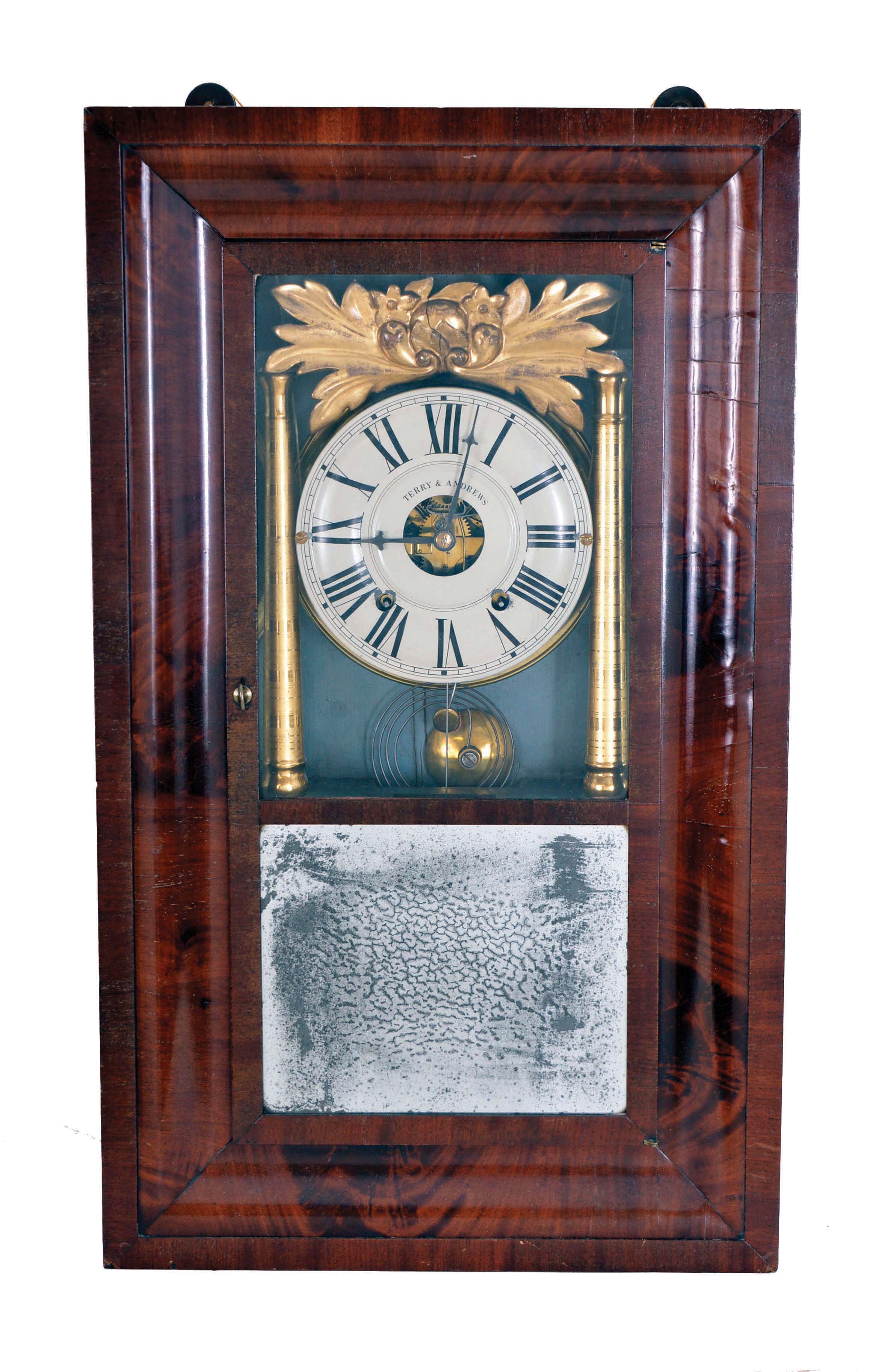 Terry & Andrews, Bristol, Conn., 8 day, time and strike, weight driven brass movement, column OG shelf clock. This clock usually seen with a Joseph Ives or Hills, Goodrich & Co. label. Joseph Ives designed the movement. — Antique Clocks Price Guide