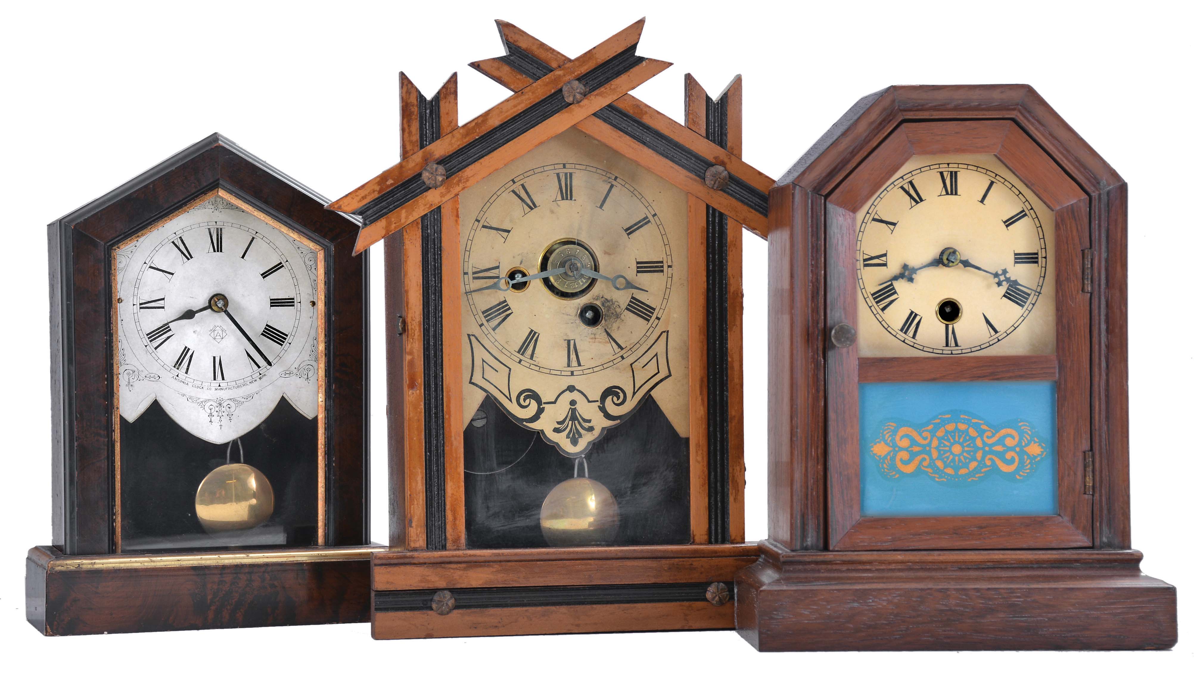 Clocks- 7 (Seven): (1) Ansonia Clock Co., New York, unidentified cottage shelf clock with a spring driven 30 hour timepiece movement in a wood case, c1890; (2) E. Ingraham & Co., Bristol, Conn., "OK" shelf clock with a spring driven 30 hour time and alarm movement in a light wood case, c1884; (3) Jerome and Co., New Haven, Conn., unidentified cottage shelf clock with a spring driven 30 hour movement in a rosewood veneered case, c1870; (4) Jerome & Co., New Haven, Conn., "Rose Cottage" shelf clock with a spring driven 30 hour time and alarm movement in a rosewood veneered case, c1870; (5) Seth Thomas Clock Co., Thomaston, Conn., cottage shelf clock with a spring driven 30 hour movement in a rosewood and mahogany veneered case, c1875; (6) Badenia Clock Manufactory, Bavaria, Germany cottage shelf clock with a spring driven 30 hour time and alarm movement in a grained wooden case, c1870; (7) Seth Thomas Clock Co., Plymouth Hollow, Conn. cottage shelf clock with a spring driven time and alarm movement in a rosewood veneered case, c1860. — Antique Clocks Price Guide