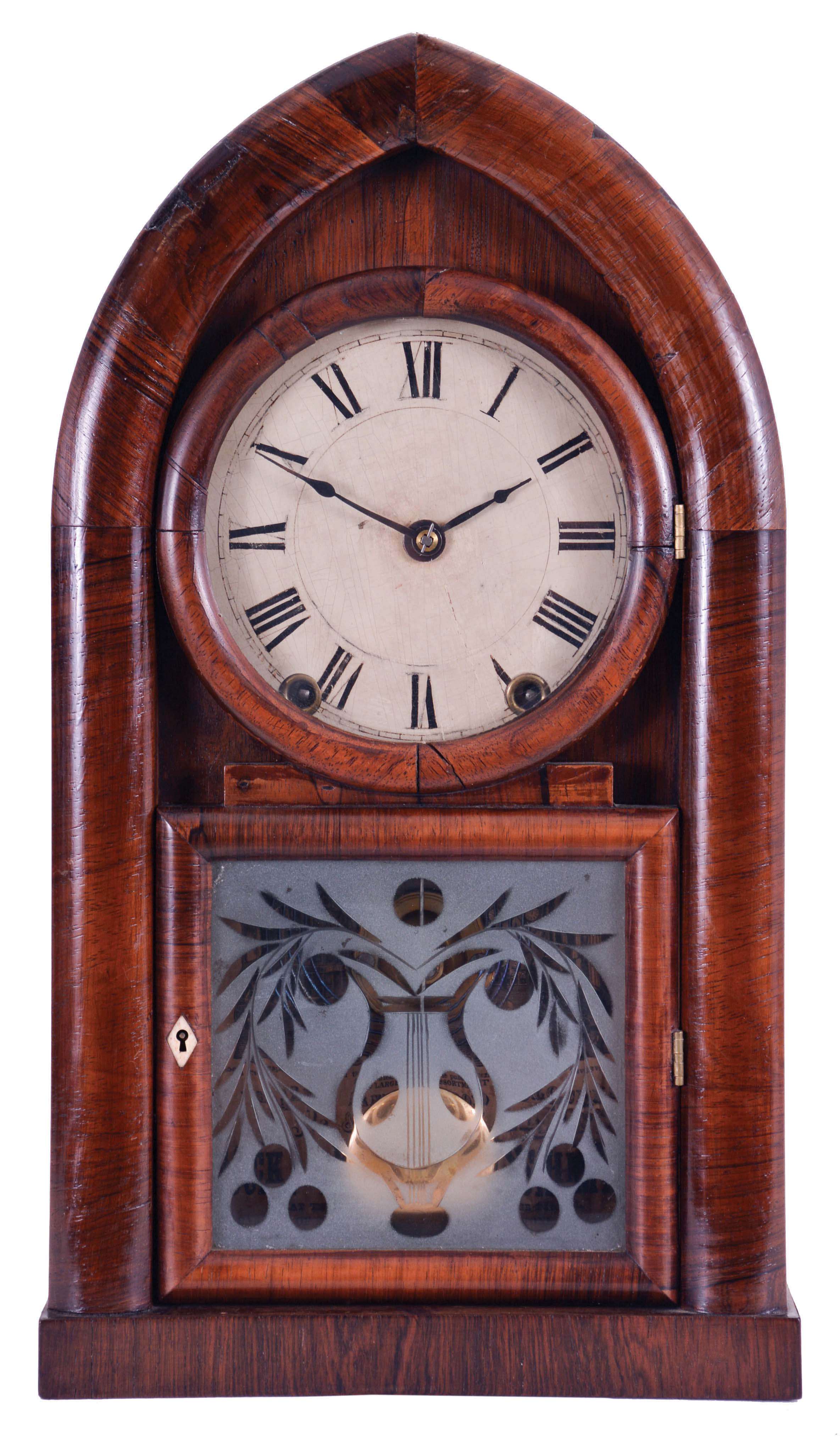 J. J. Beals, Boston, Mass. (Brewster & Ingrahams, Bristol, Conn.) 8 day, time and strike spring driven movement Round Gothic or beehive shelf clock. This is a rack striking movement with the springs contained in cast iron cups. — Antique Clocks Price Guide