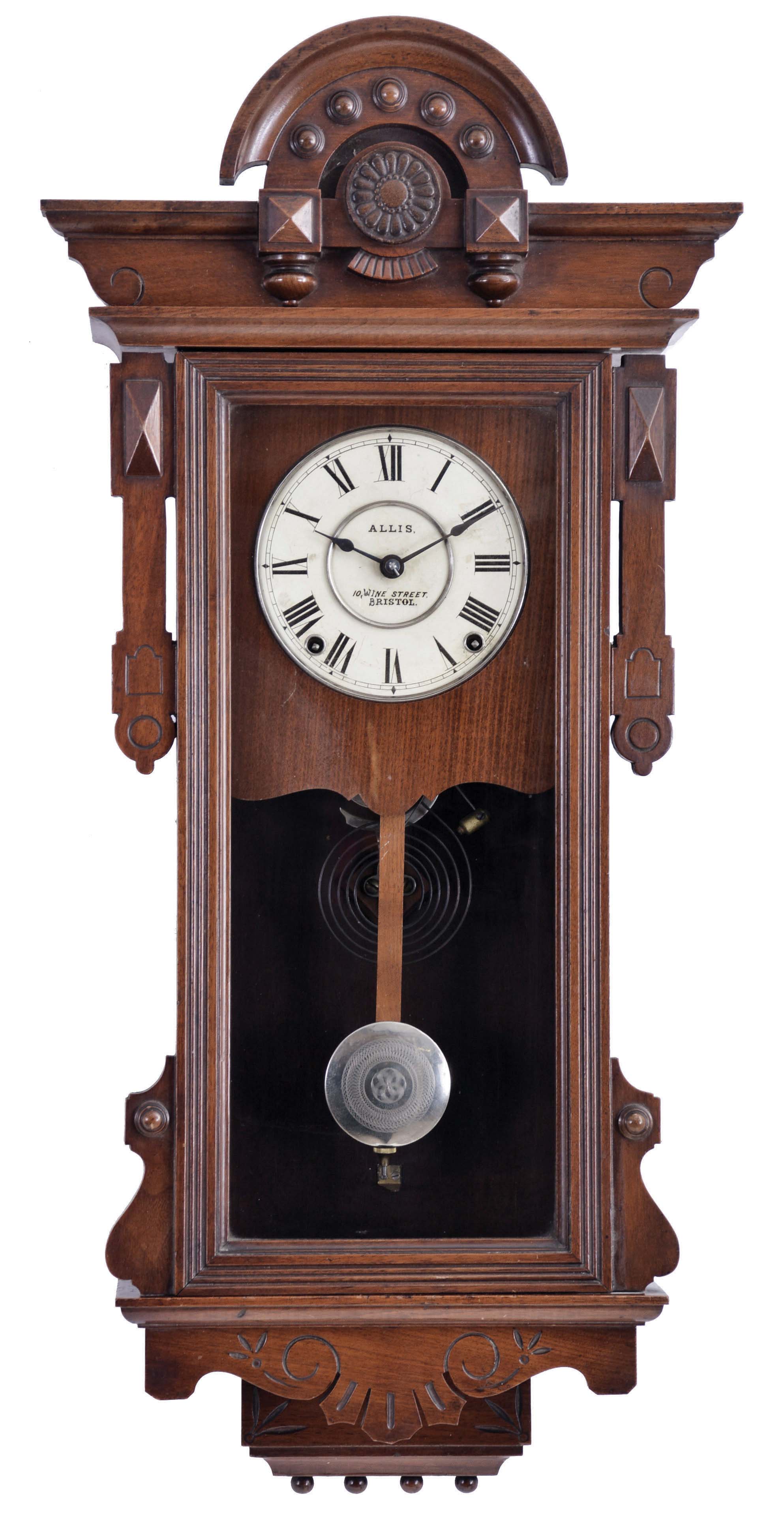 Seth Thomas Clock Co., Thomaston, Conn., "Panama" hanging clock with a spring driven, 8 day, time and strike, (cathedral gong) lyre movement in a walnut case. — Antique Clocks Price Guide