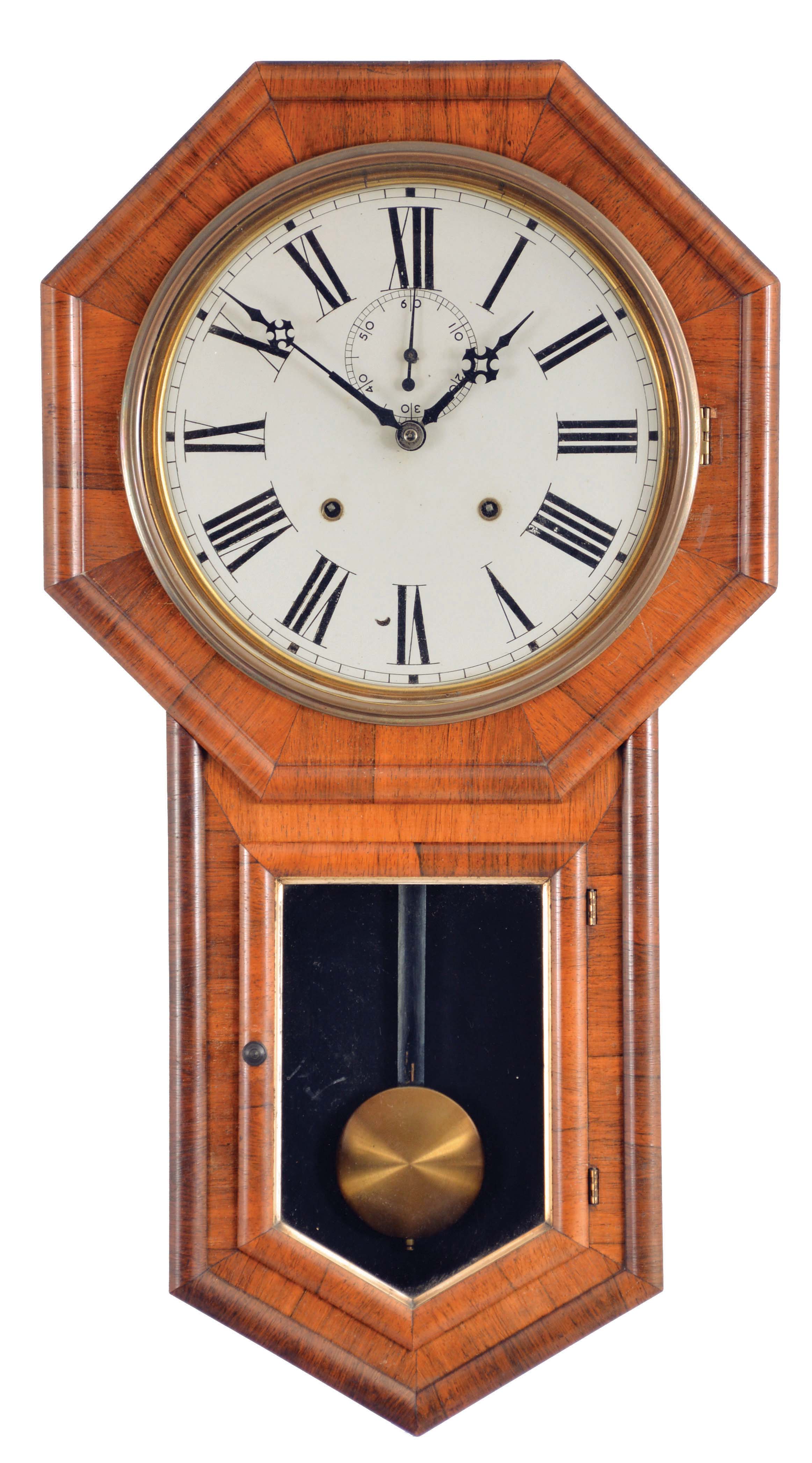 E. N. Welch Mfg. Co., Forestville, Conn., "Verdi" hanging clock with a spring driven, 8 day, time and strike movement is a rosewood veneered case. — Antique Clocks Price Guide