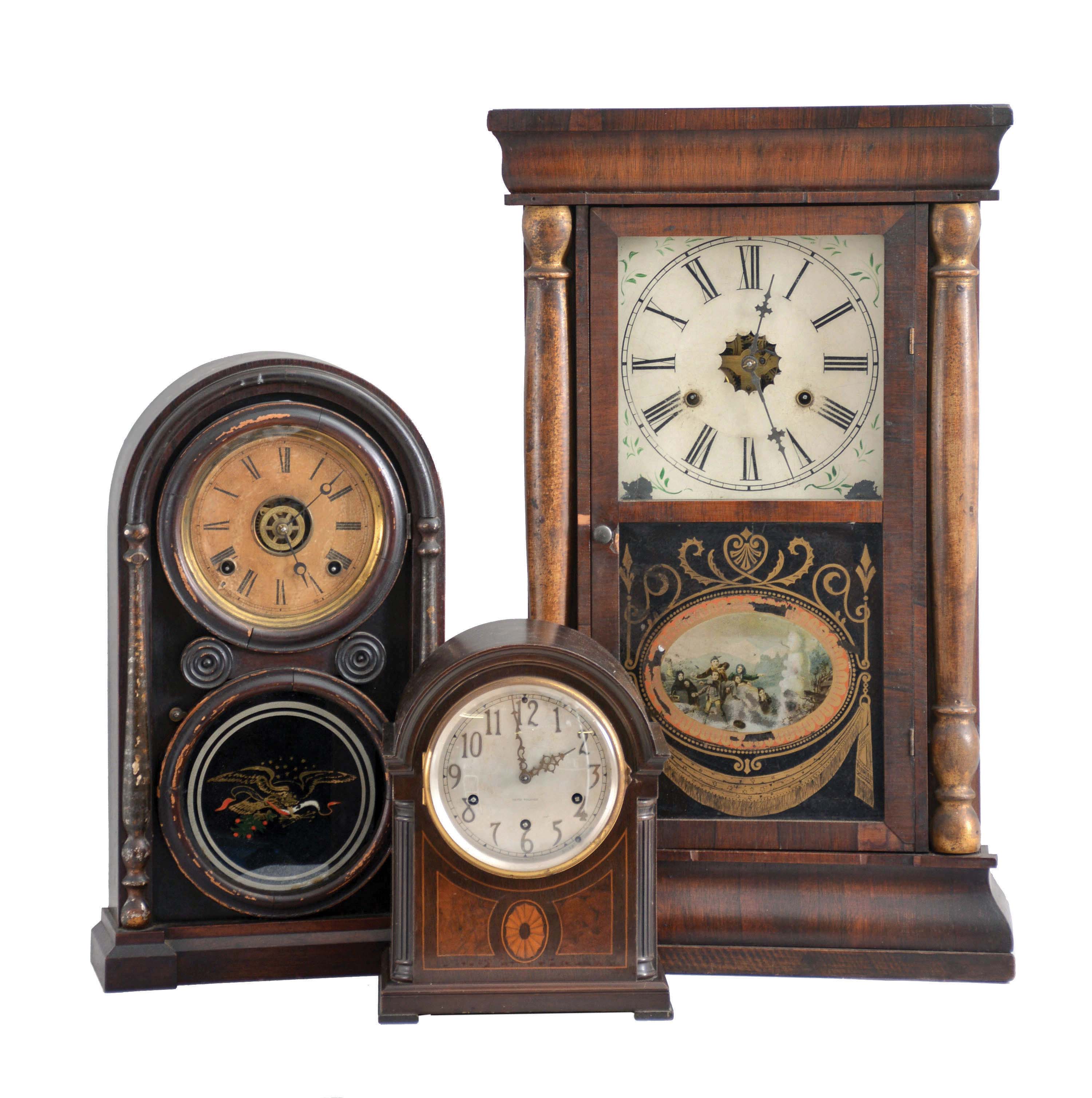 Clocks- 3 (Three): (1) Seth Thomas Clock Co., Thomaston, Conn., "Chime Clock No. 96", 8 day, time and strike Westminster chime spring driven movement mantel clock, c1913; (2) Daniel Pratt & Sons, Reading, Mass., 8 day, time and strike spring driven movement round top shelf clock, c1870; (3) American, 30 hour, time and strike, weight driven brass movement column shelf clock, c1860 — Antique Clocks Price Guide
