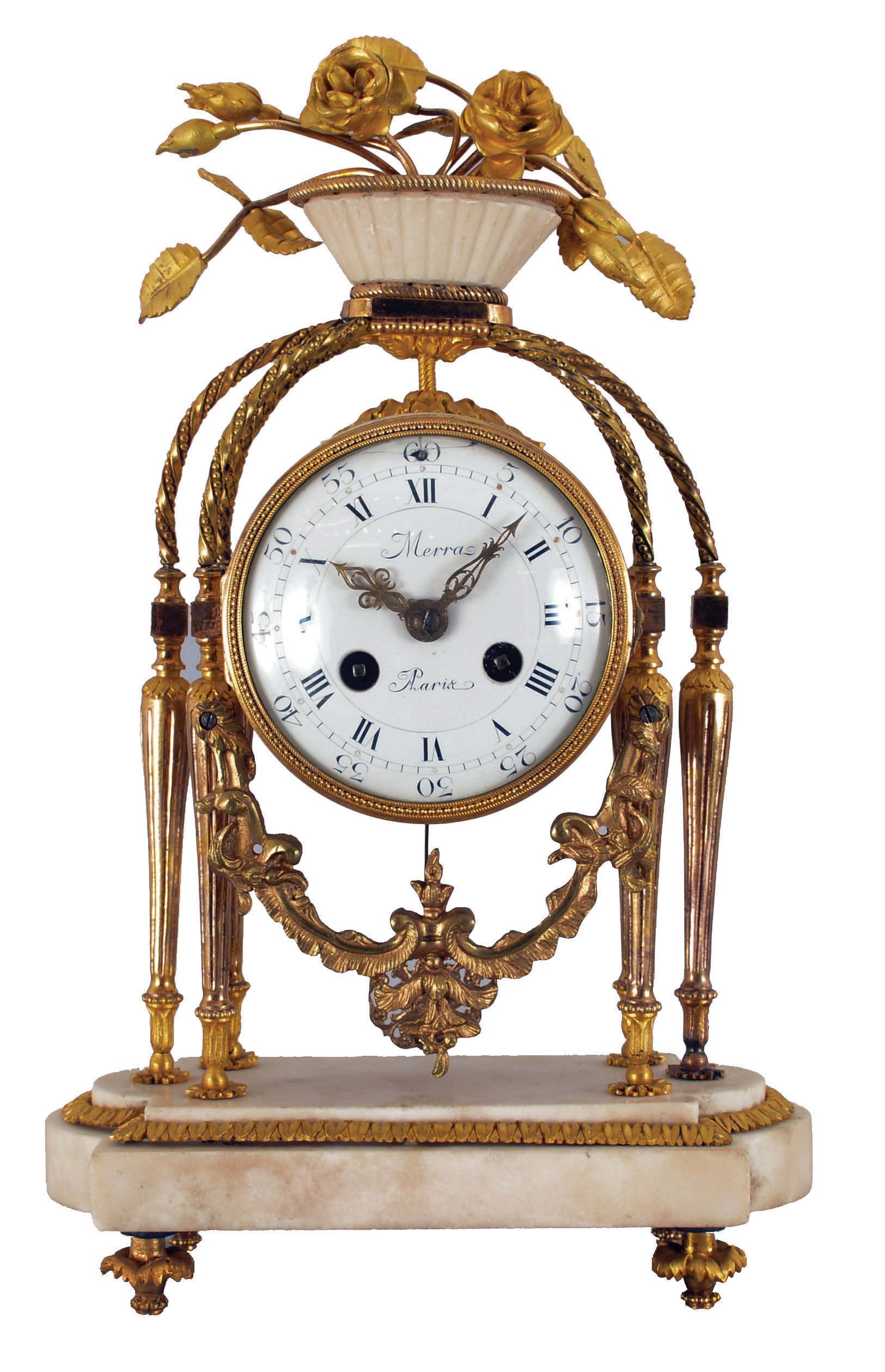 French: Merra, Paris, mantel clock, 8 day, time and strike, count wheel and bell movement with silk thread suspension by Vincenti & Cie., Paris. White marble case with gilt hardware, fluted columns and twisted arched supports, the top with large gilt roses in bloom. Signed white porcelain dial with Roman numerals. — Antique Clocks Price Guide