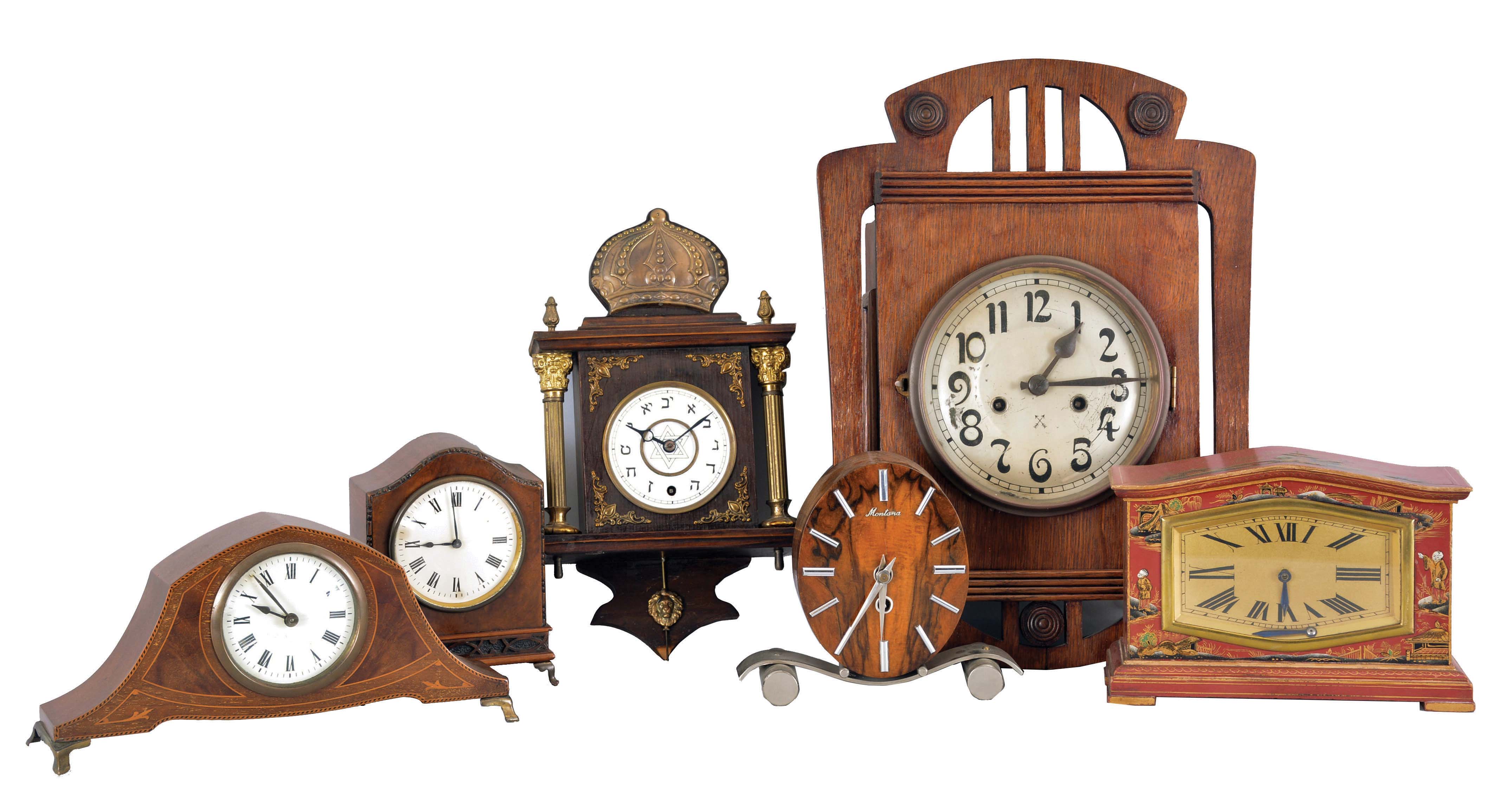 Clocks- 6 (Six) French and German Desk and Wall: (1) France, mantel clock, 8 day time only platform movement in a red wood case with Asian inspired design; (2) Hamburg American Clock Co., Germany, wall clock, 8 day, time and strike, spring driven clock in a oak case with silvered metal dial; (3) France, desk clock, 8 day, time only with a cylinder escapement in a walnut and mahogany veneered case with white paper dial; (4) Germany, desk clock, 8 day, time only in an inlaid mahogany case with white enamel dial; (5) France, "Montana" desk clock, 8 day, time only balance wheel movement in a Mid-Century Modern figured veneer case; (6) Germany, wall clock, 30 hour time only, spring driven in a dark wood case with metal columns and spandrels with a white enamel dial featuring a star of David and numerals in Hebrew. — Antique Clocks Price Guide