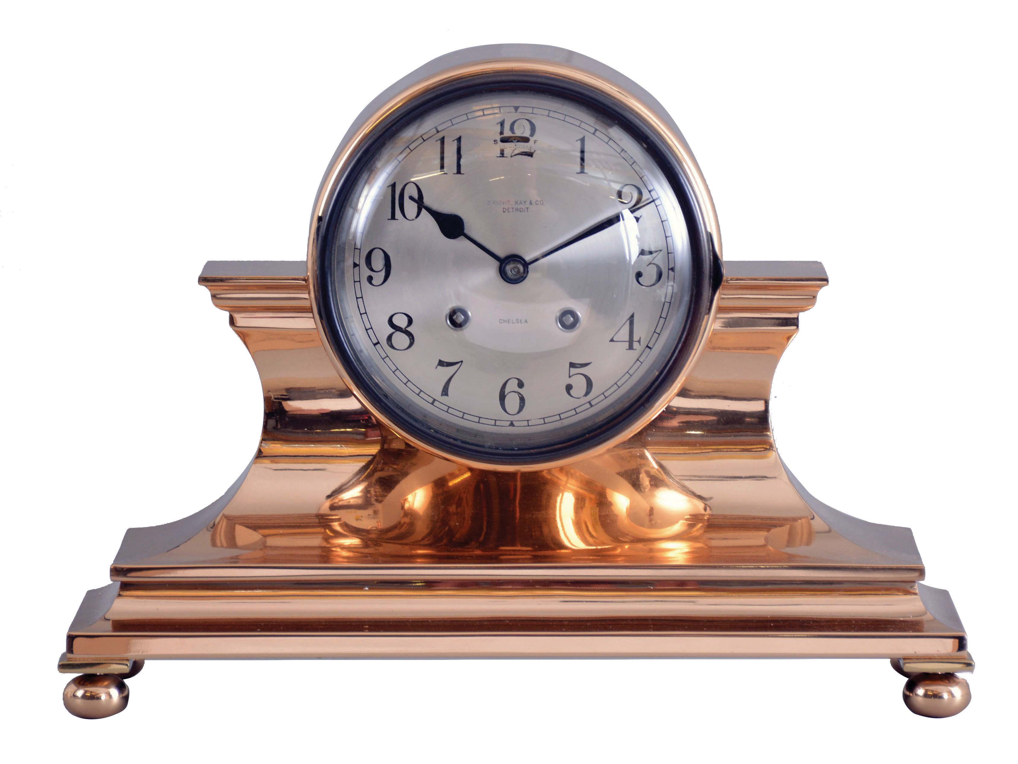 Chelsea Clock Co., Boston, Mass., "Tambour No. 1", bronze case with brass ball feet, 5" Arabic numeral silvered dial with patinated bezel, and marked "Wright, Kay & Co., Detroit, blued steel hands, 8 day time and house strike movement with lever escapement, serial #163040 — Antique Clocks Price Guide
