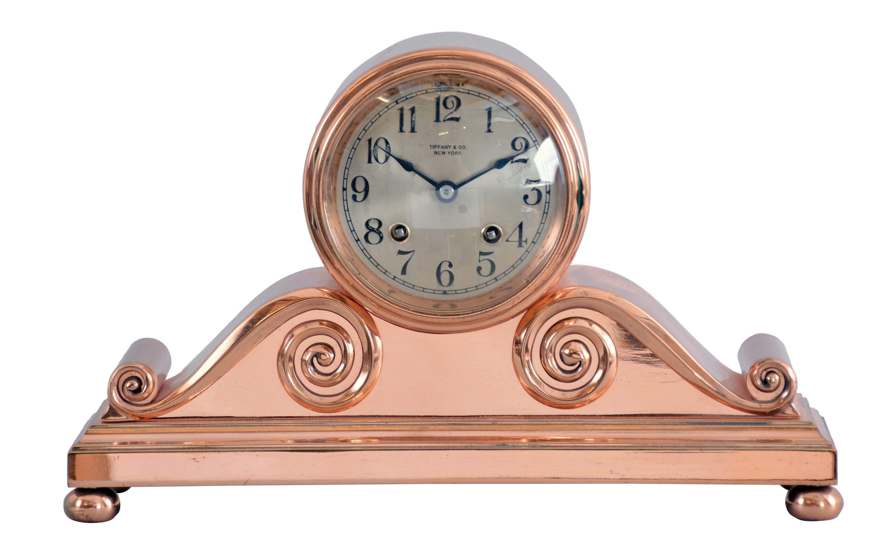 Chelsea Clock Co., Boston, Mass., for Tiffany & Co., "Tambour No. 2", copper bronze case on compressed ball feet feet, 4" Arabic numeral silvered dial signed "Tiffany & Co., New York", blued steel hands, 8 day time and house strike movement with lever escapement, serial #115819 — Antique Clocks Price Guide