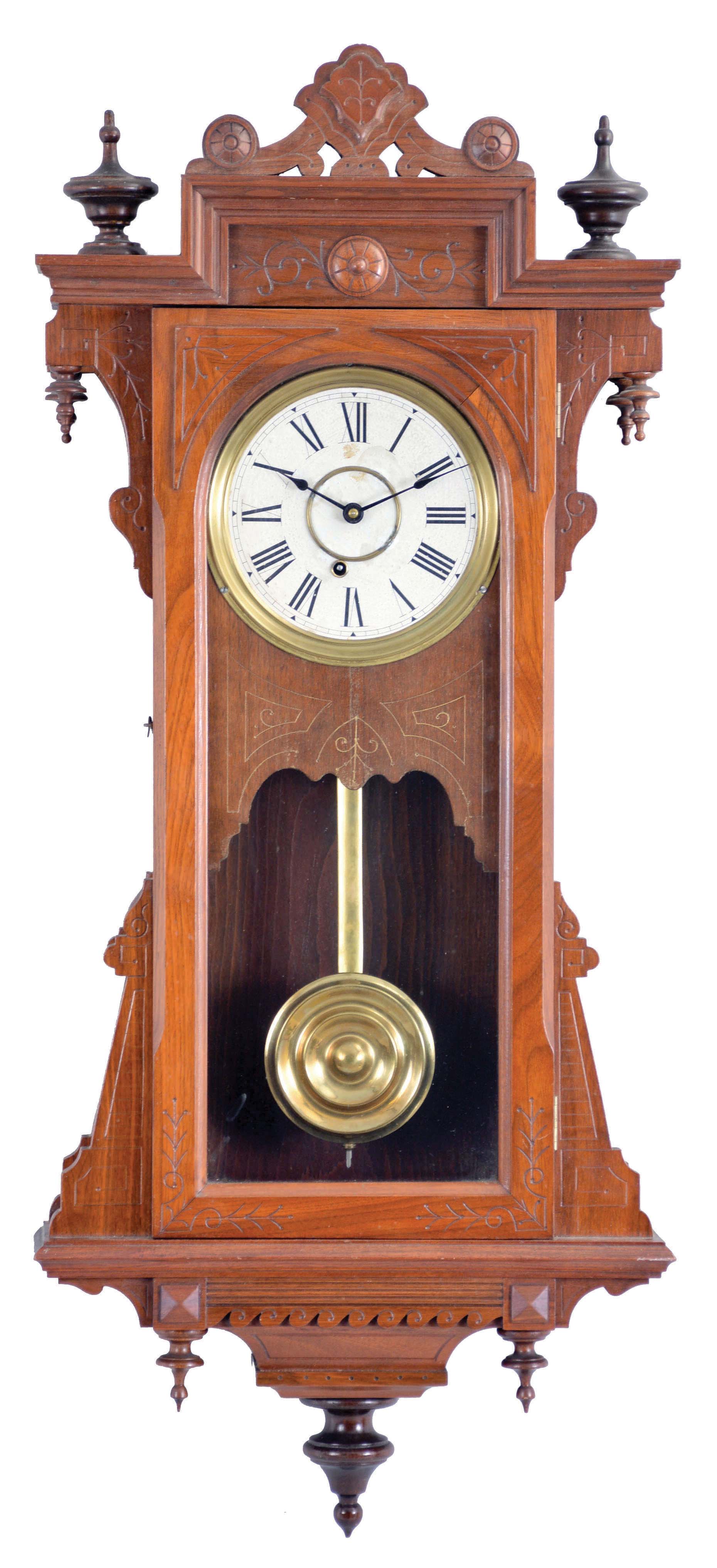 E. Ingraham & Co., Bristol, Conn., "Bartholdi" wall hanging clock with a spring driven, 8 day timepiece movement in a walnut case. — Antique Clocks Price Guide